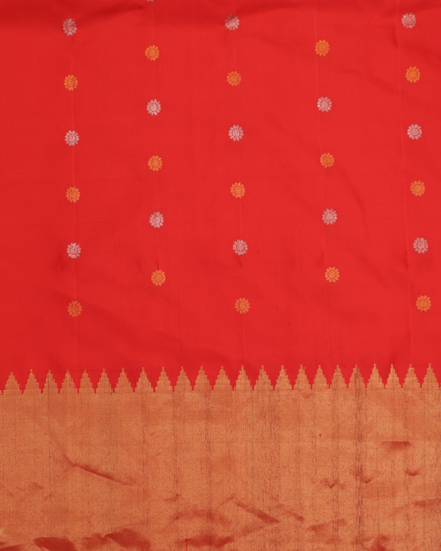 Gadwal silk saree in cream with zari buttas and orange contrast