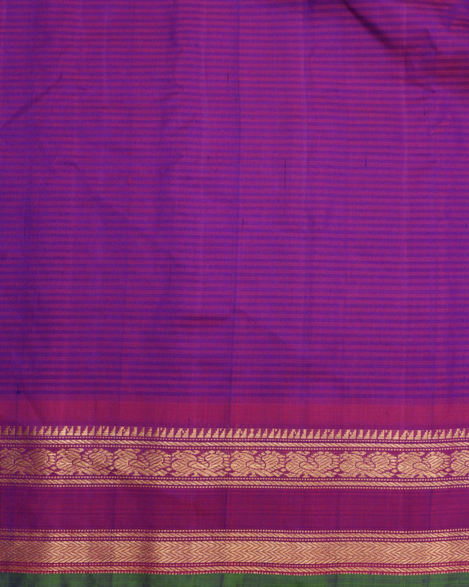 Contrast blouse in purple for peach Gadwal silk saree