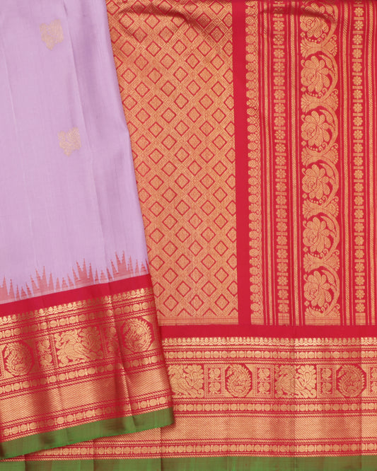 Lavender Gadwal Silk Saree with red zari border and green selvedge
