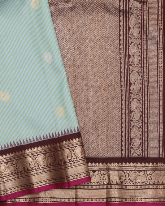 Sea green Gadwal silk saree with coffee brown zari border