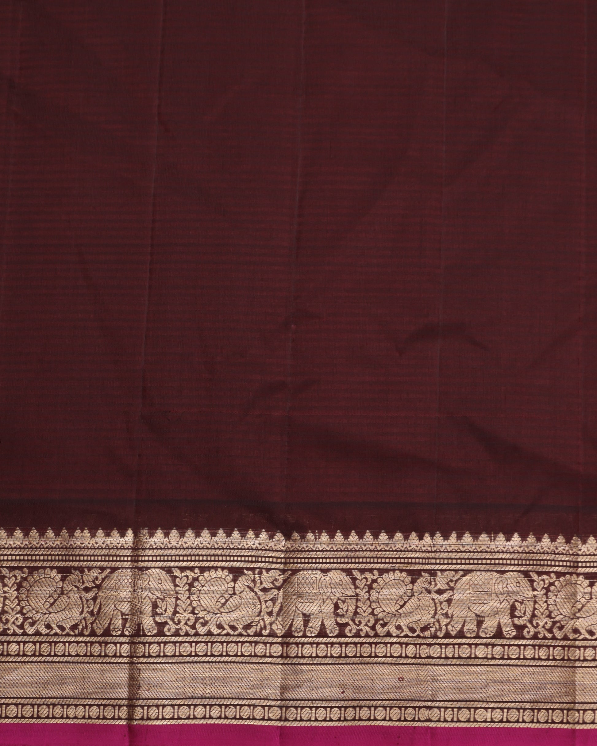 Brown unstitched blouse included with Gadwal silk saree