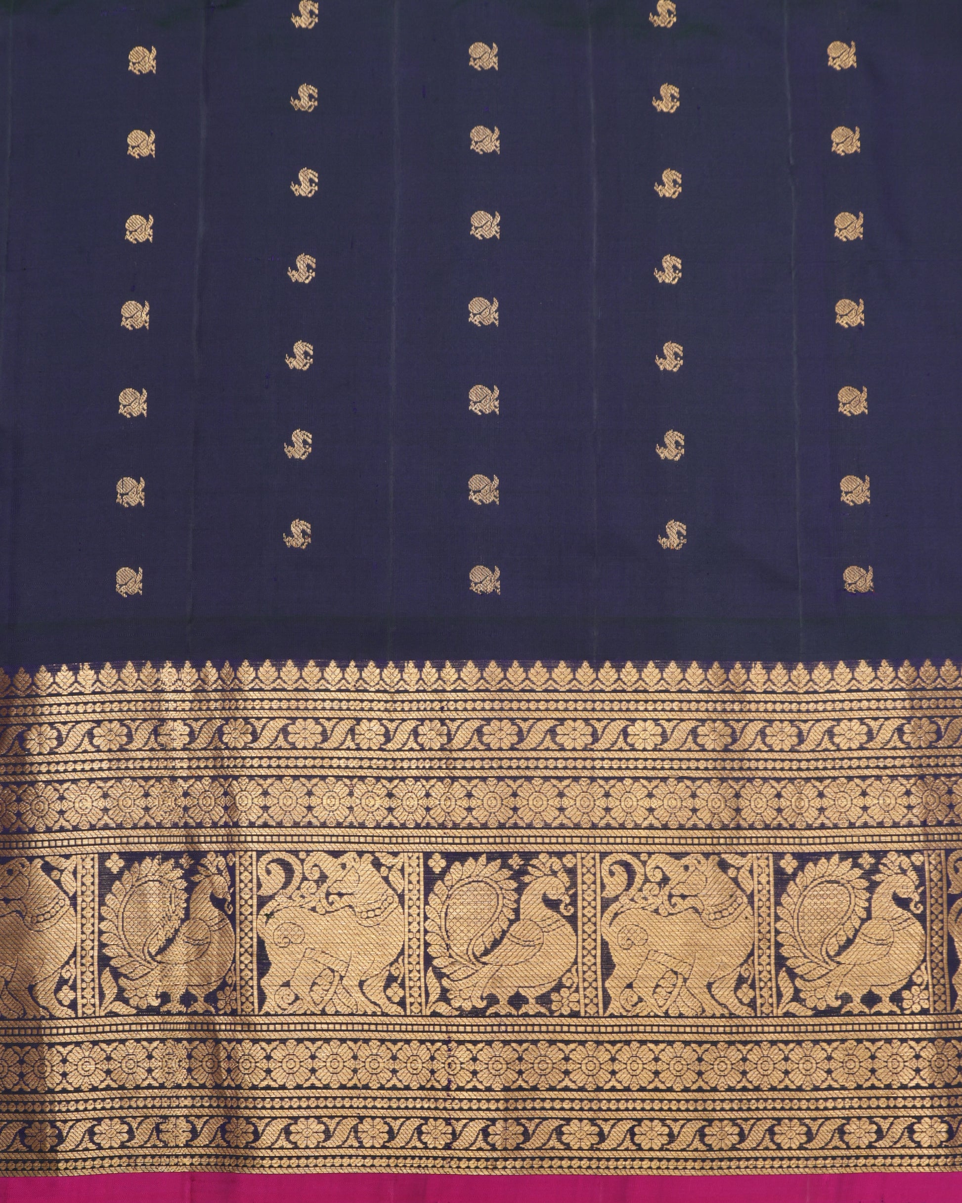 Gadwal silk saree in coral with gold zari buttas and blue border