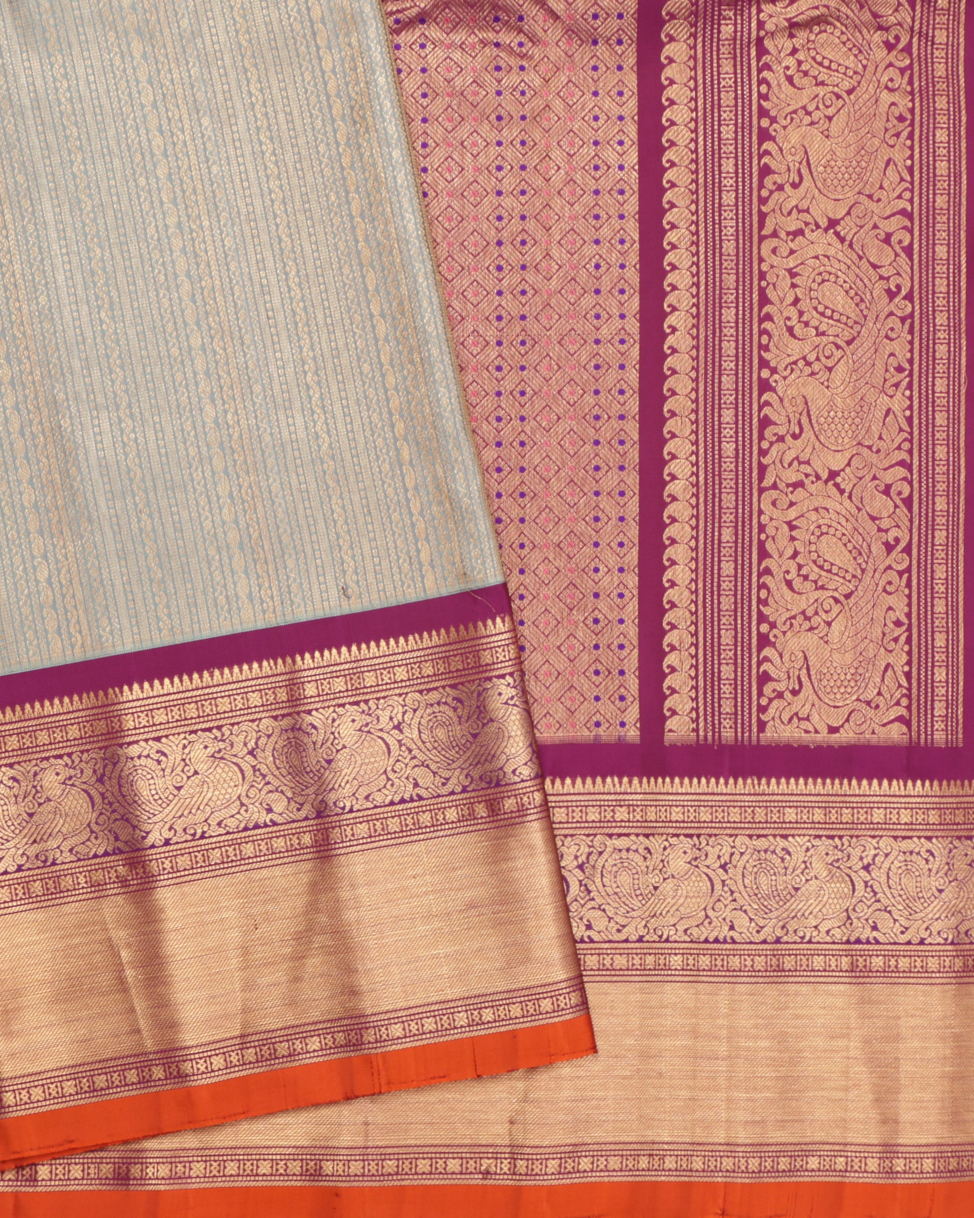 Light aqua blue Gadwal silk saree with purple border and orange selvedge