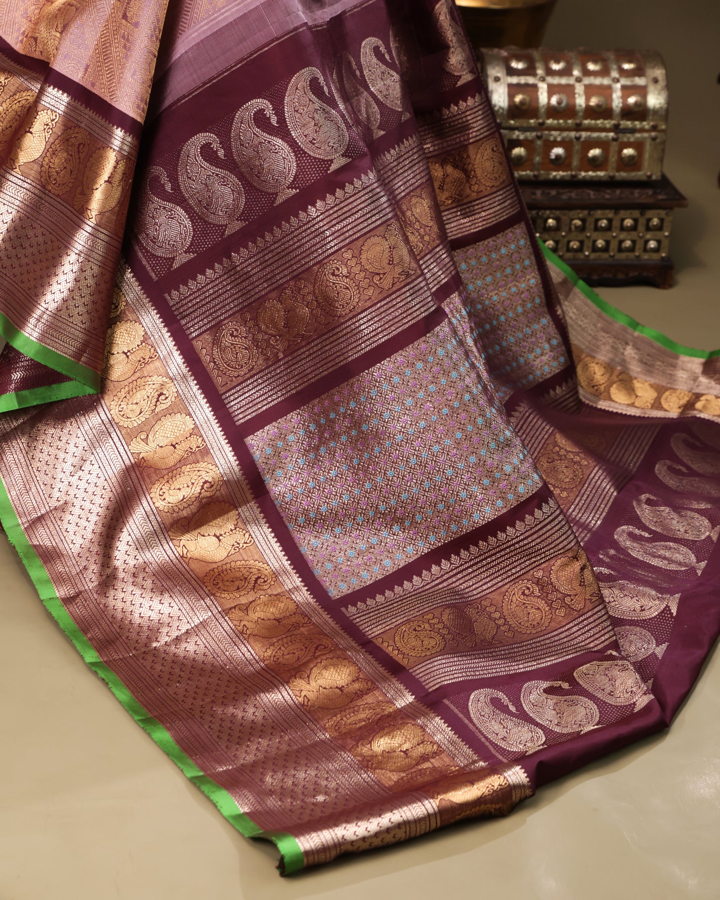 Handwoven peach Gadwal silk saree with maroon and green accents