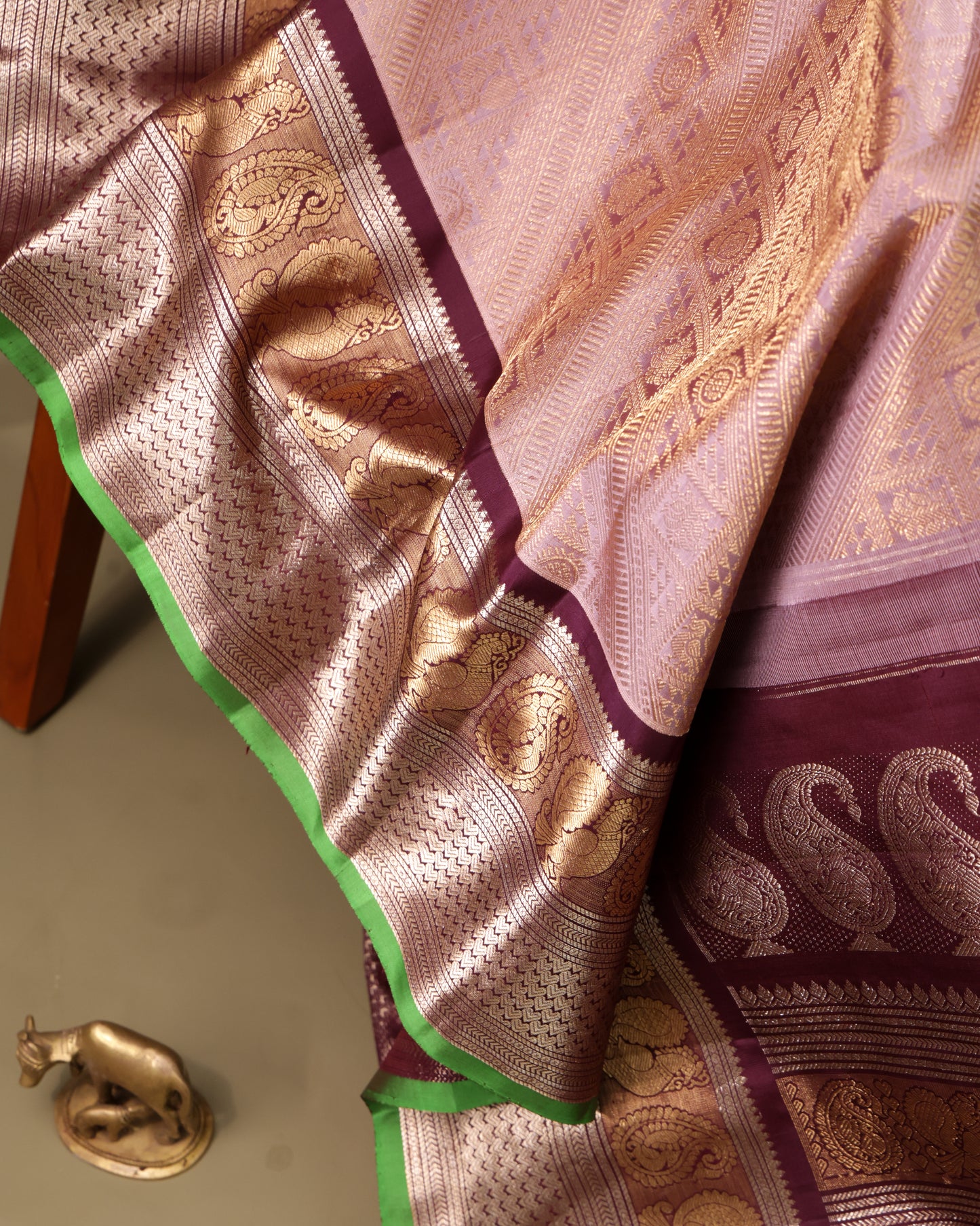 Festive brocade Gadwal silk saree in peach with gold zari detailing