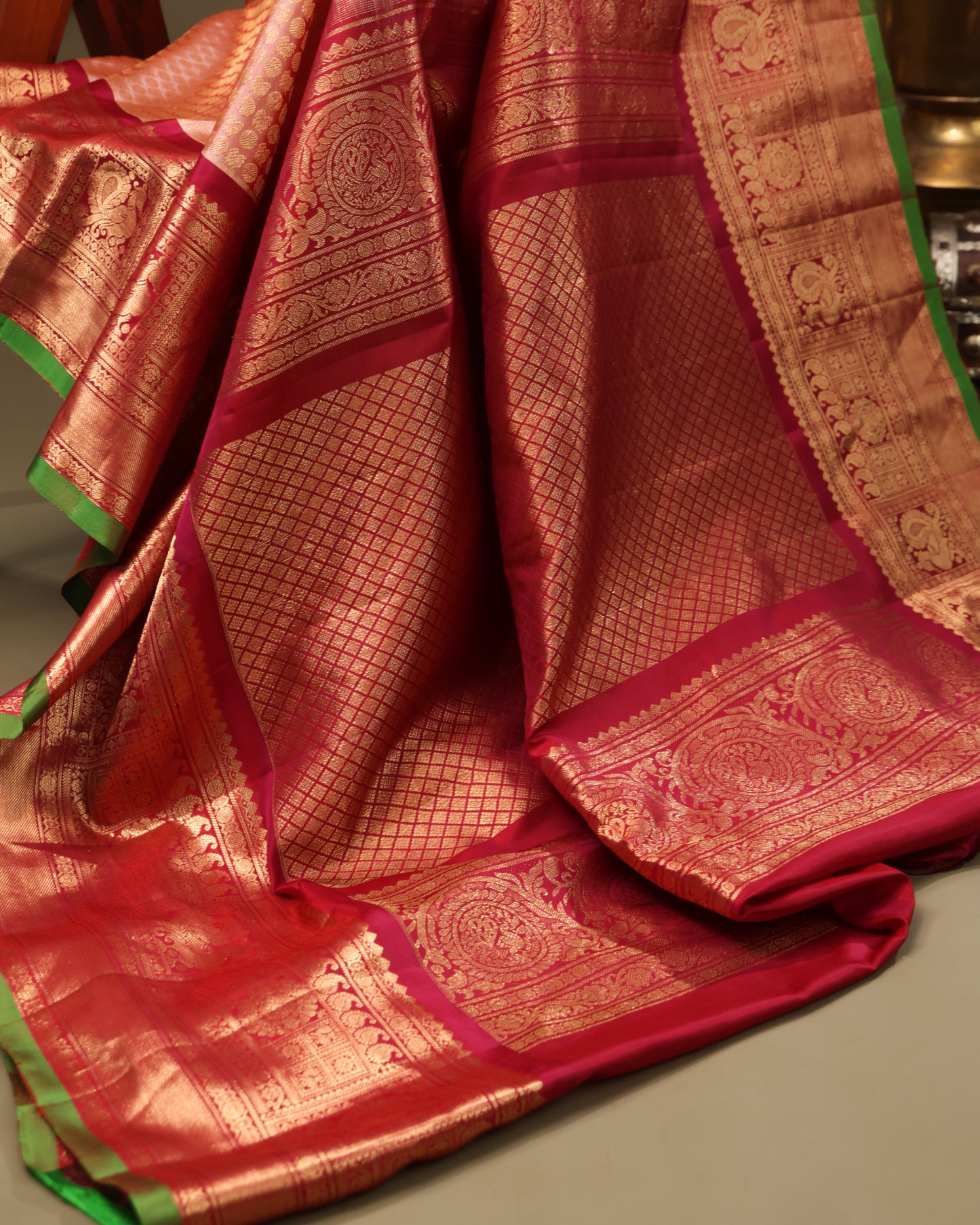 Traditional Gadwal silk saree with peach body and zari pallu