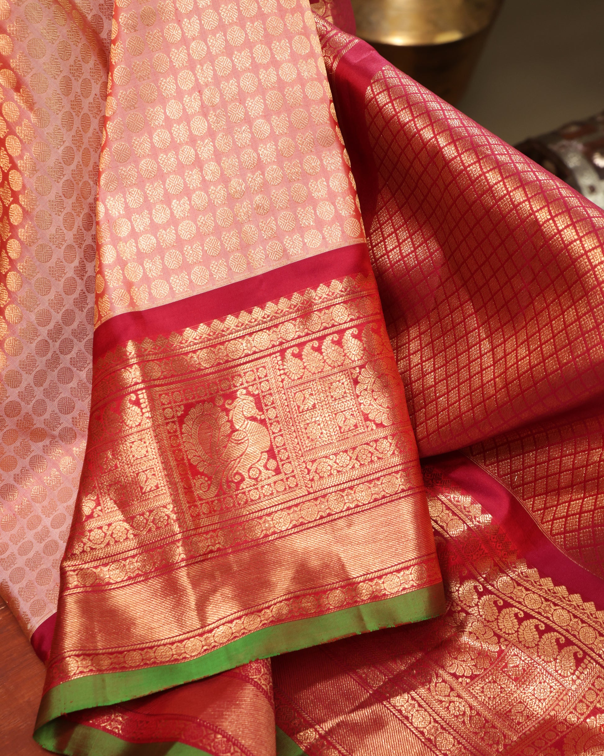 Vermilion blouse with gold zari motifs and matching border, included with Gadwal silk saree