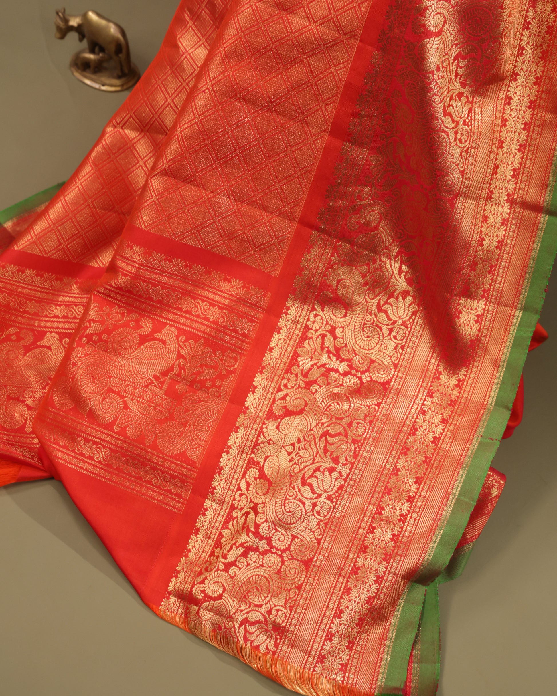 Traditional Gadwal saree in brown with rich orange border and zari pallu