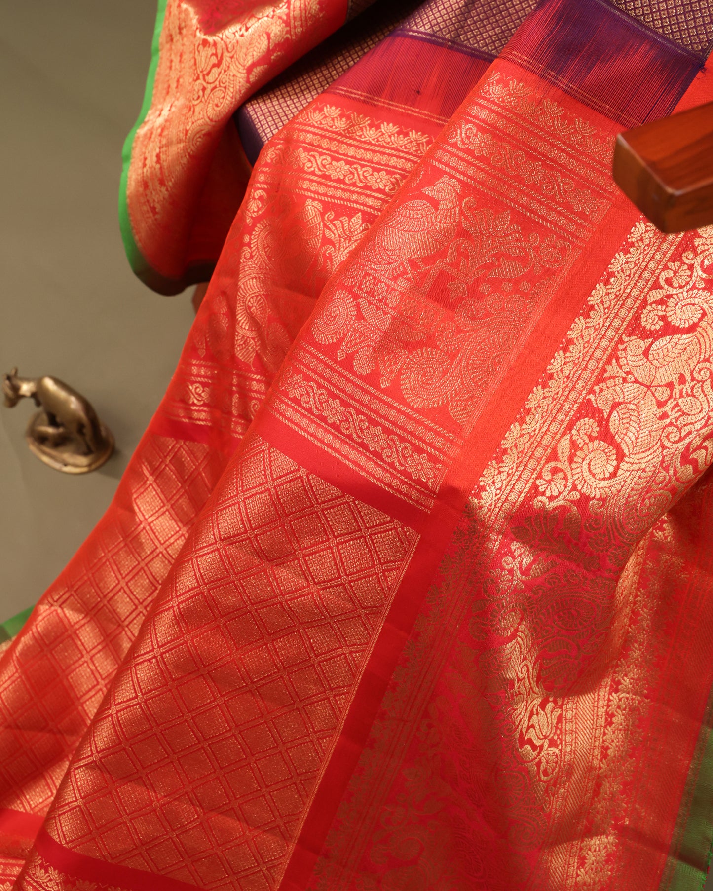 Festive brocade silk saree with brown body and green selvedge