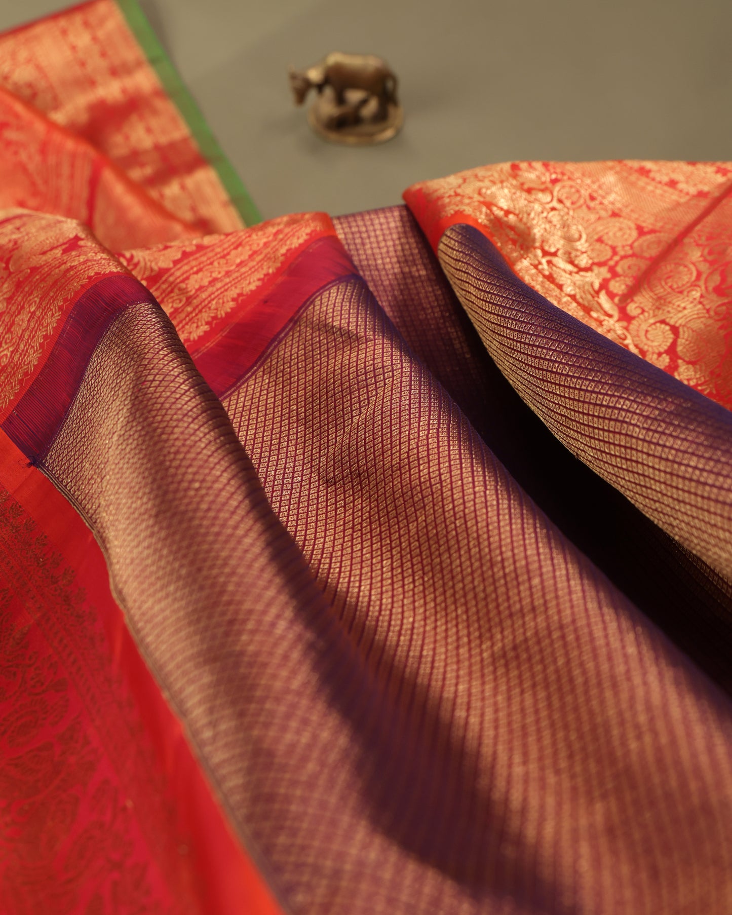 Elegant Gadwal silk brocade saree in brown with contrast orange weaving