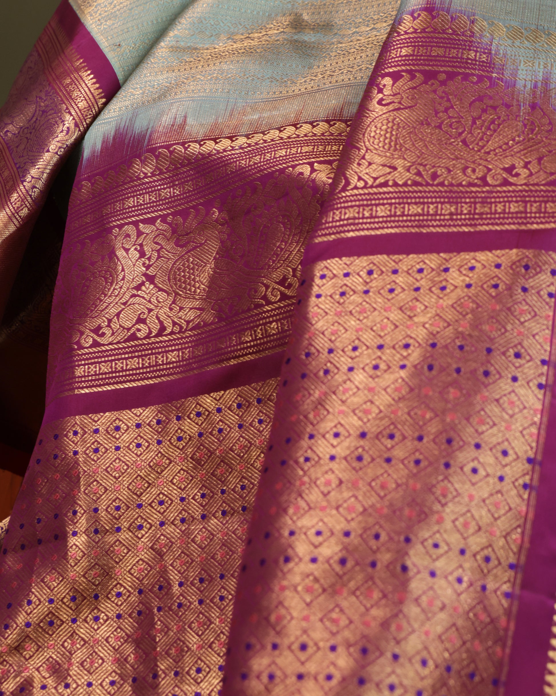 Purple blouse with gold zari buttas and border, included with Gadwal saree