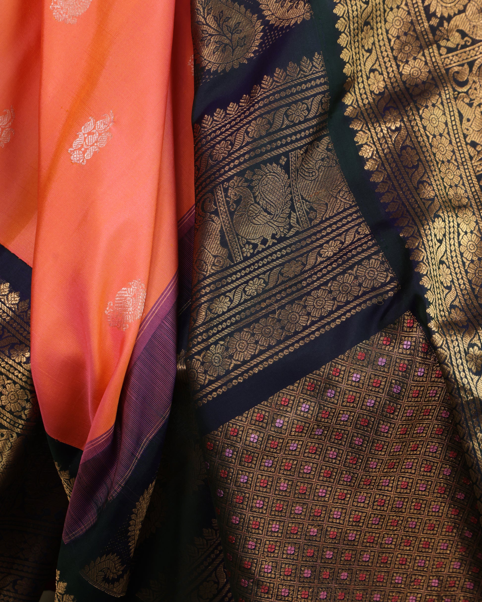 Navy blue blouse with zari buttas and border, included with Gadwal silk saree