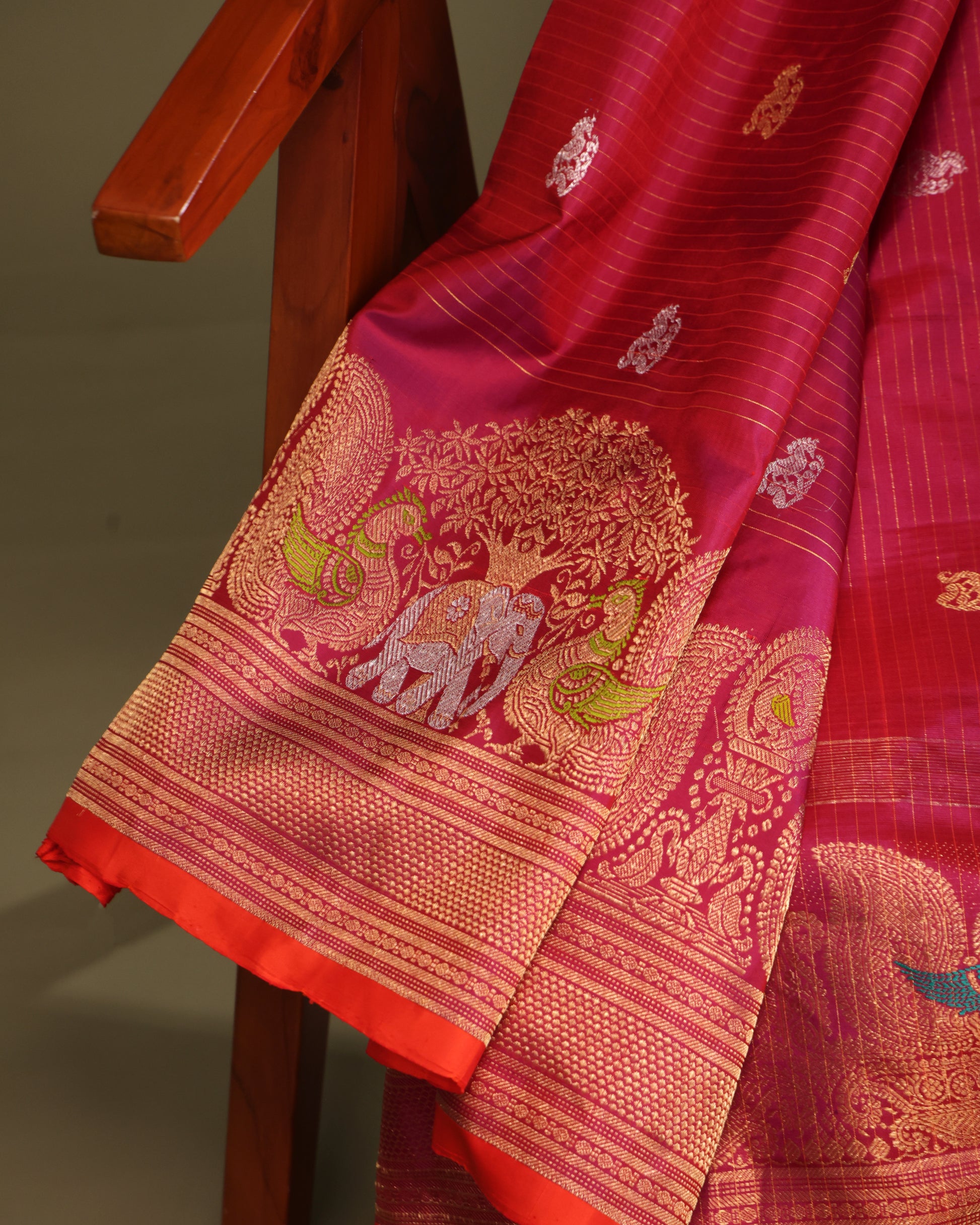 Traditional Gadwal silk saree with elephant and peacock zari details