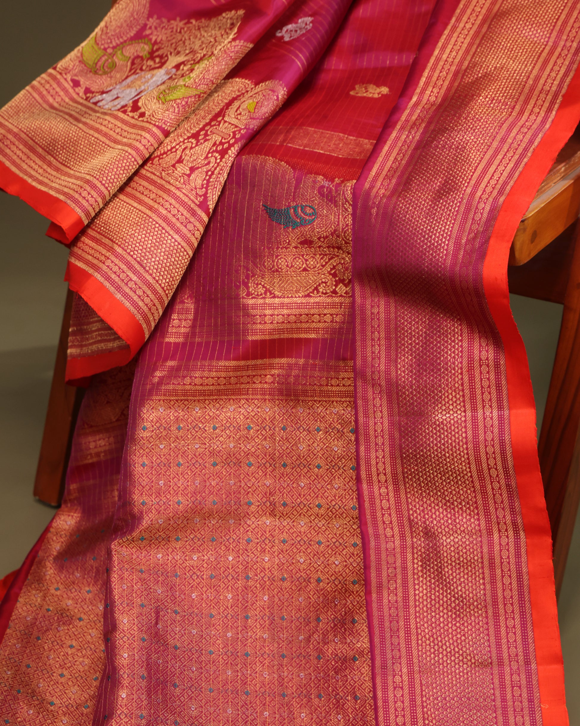 Regal red Gadwal saree with zari border and intricate weaving