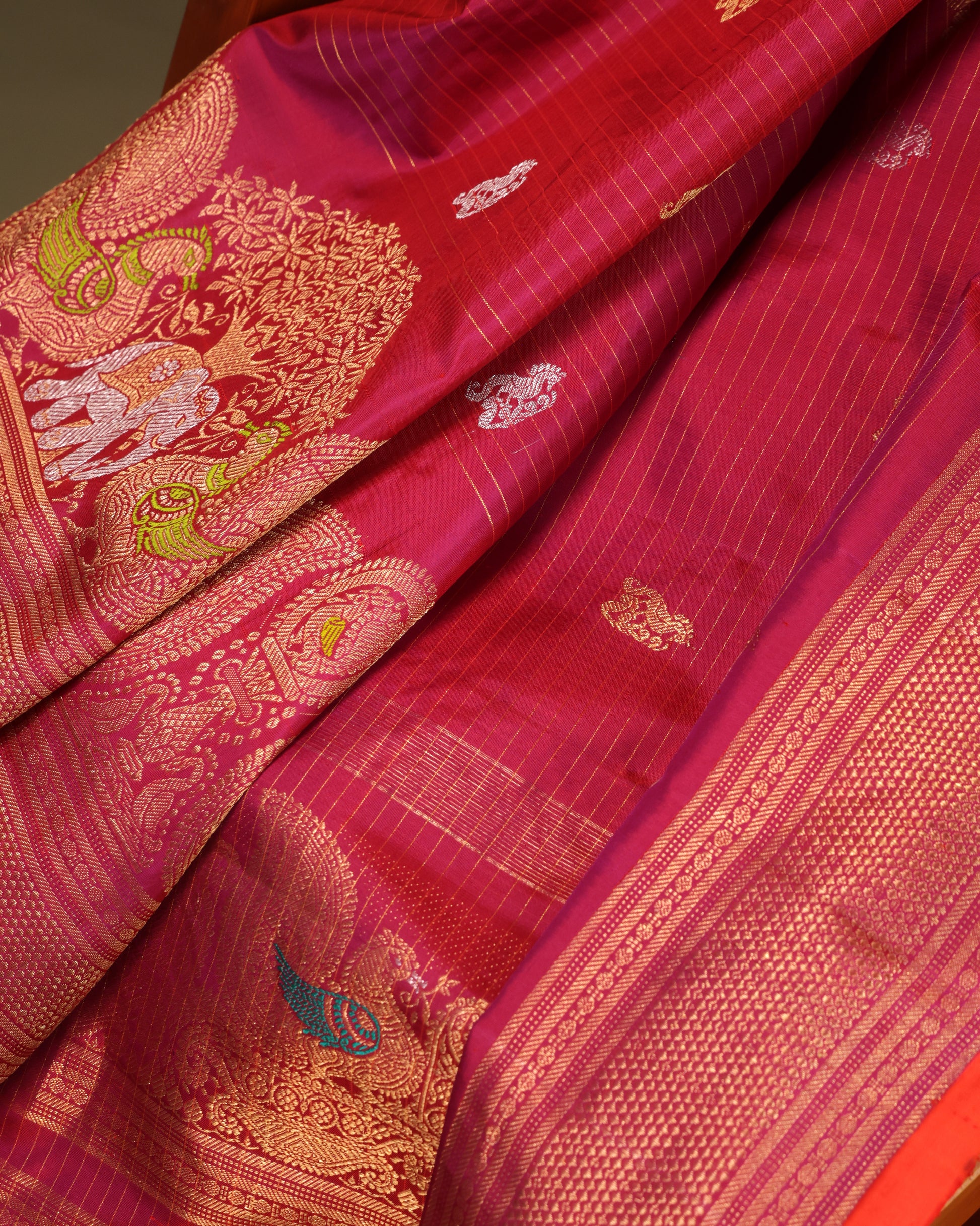 Wedding wear red Gadwal silk saree with orange blouse and zari border