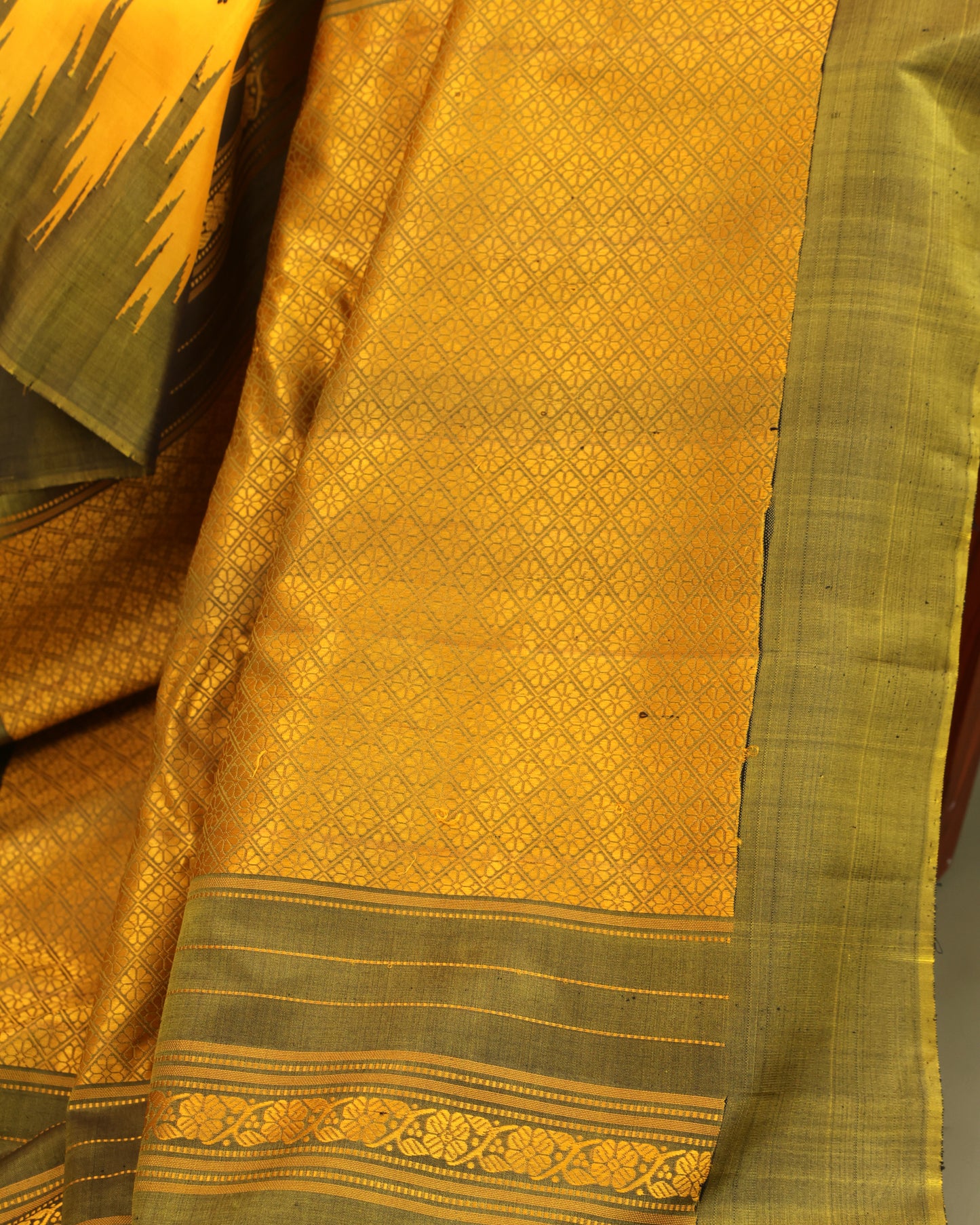 Olive green temple border design on Gadwal silk saree