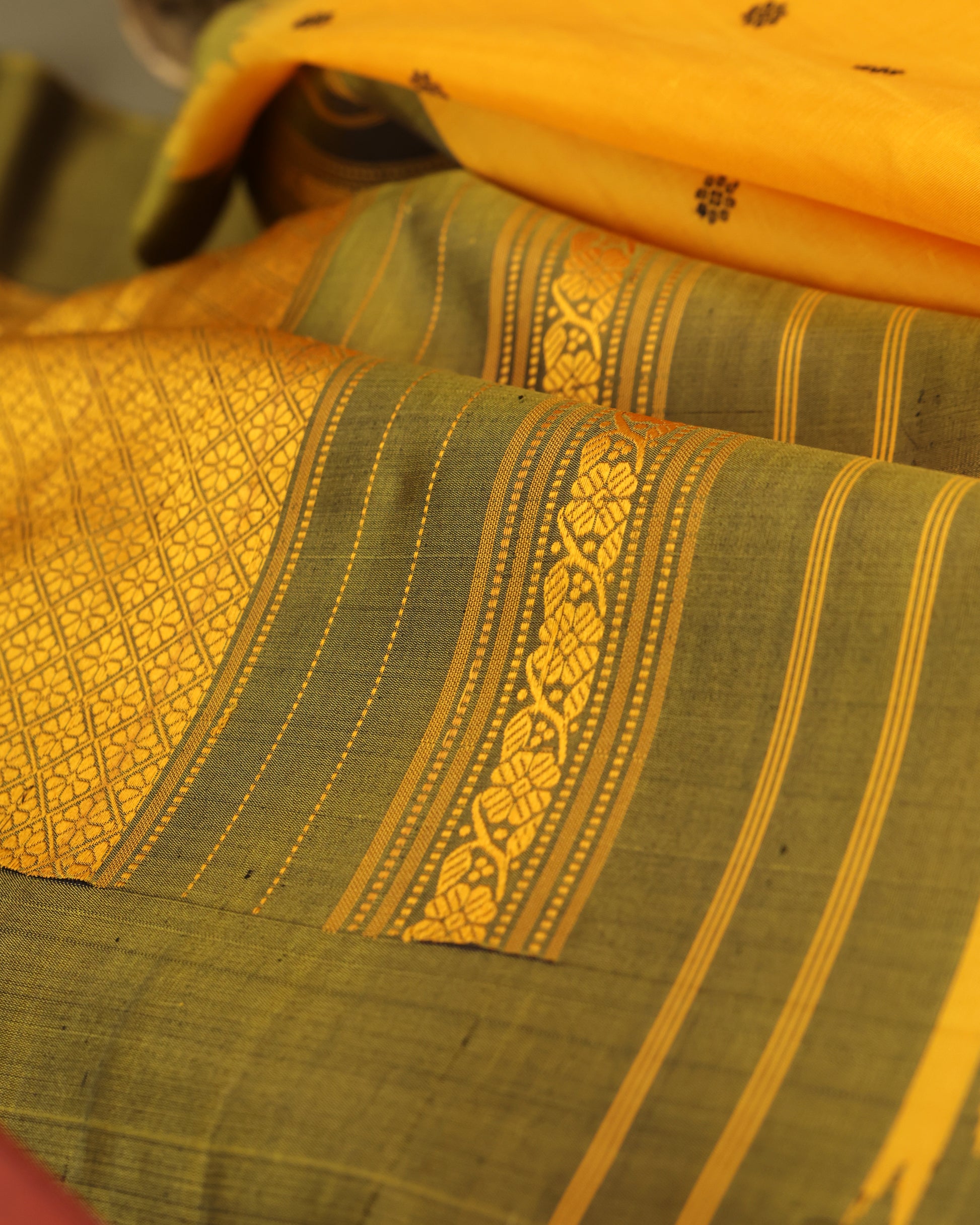 Wedding wear Gadwal silk saree in mustard and olive green