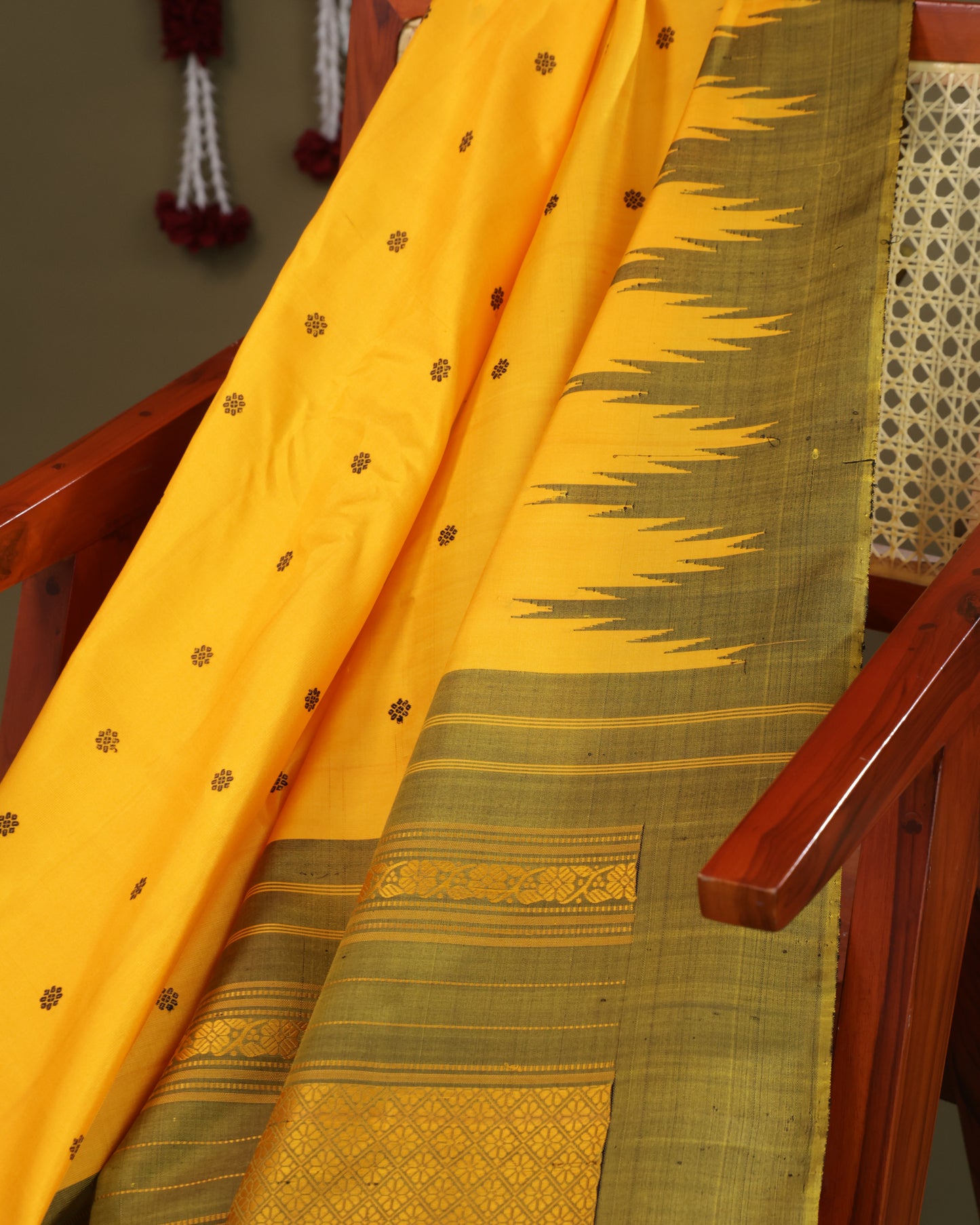 Traditional Gadwal silk saree in mustard yellow with olive green pallu