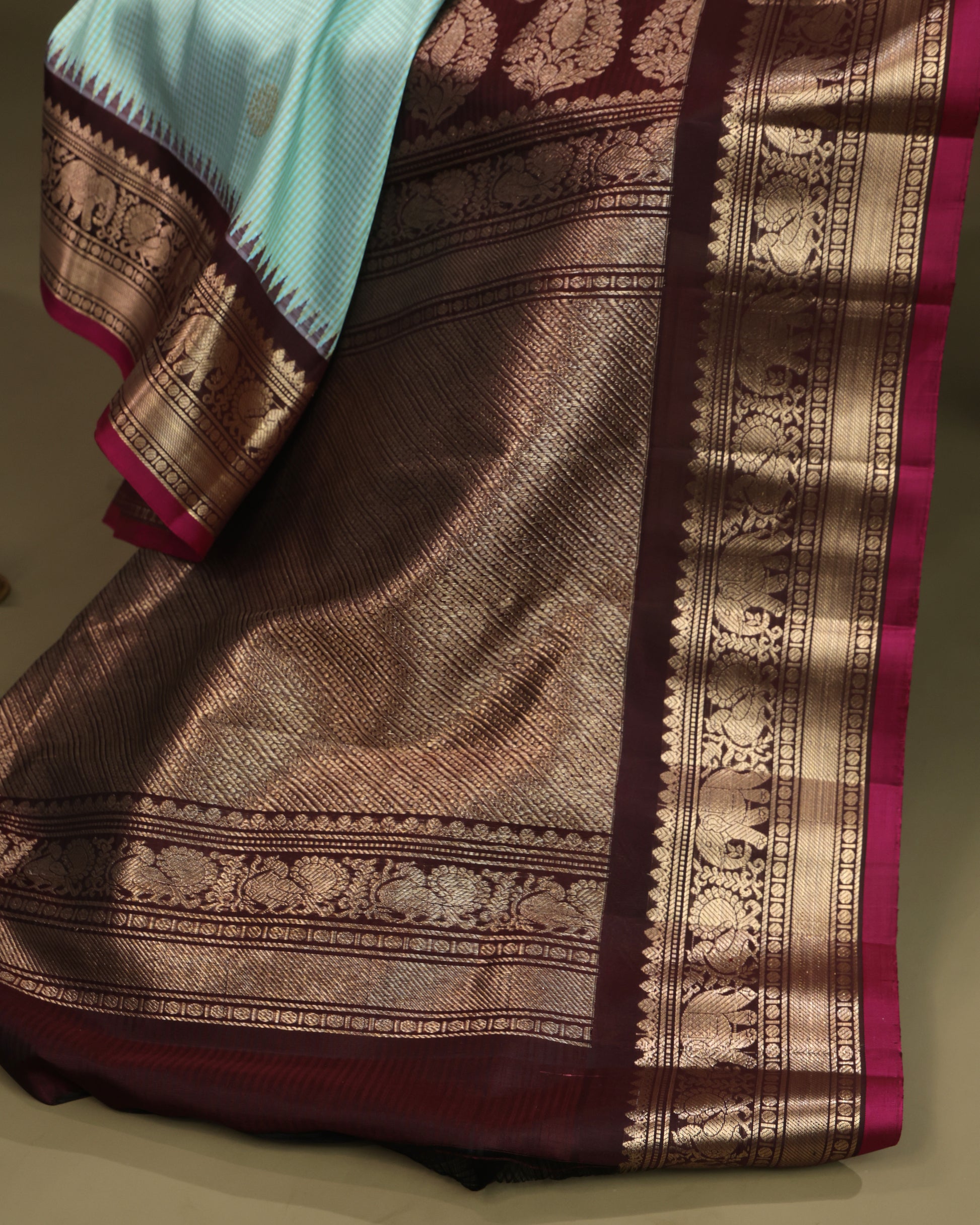 Sea green Gadwal silk saree with zari buta detailing