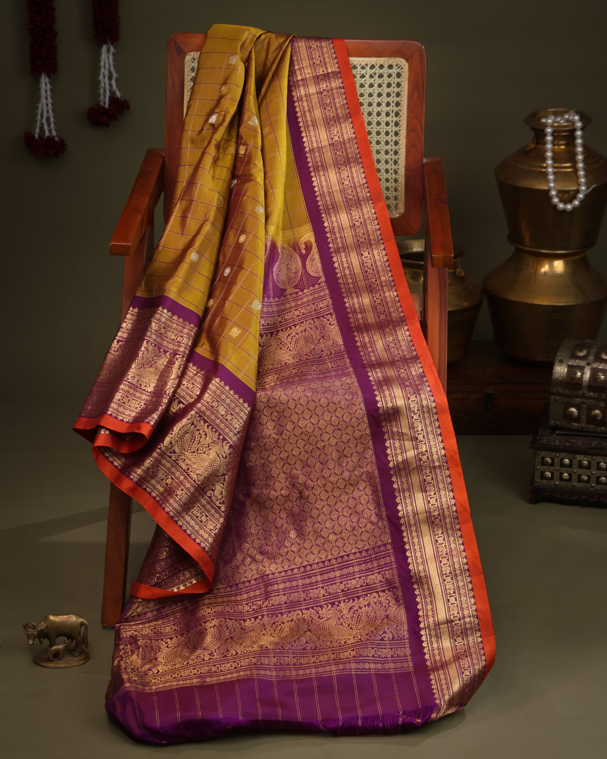 Traditional Mustard Silk Saree with Purple Zari Border and Peacock Motifs