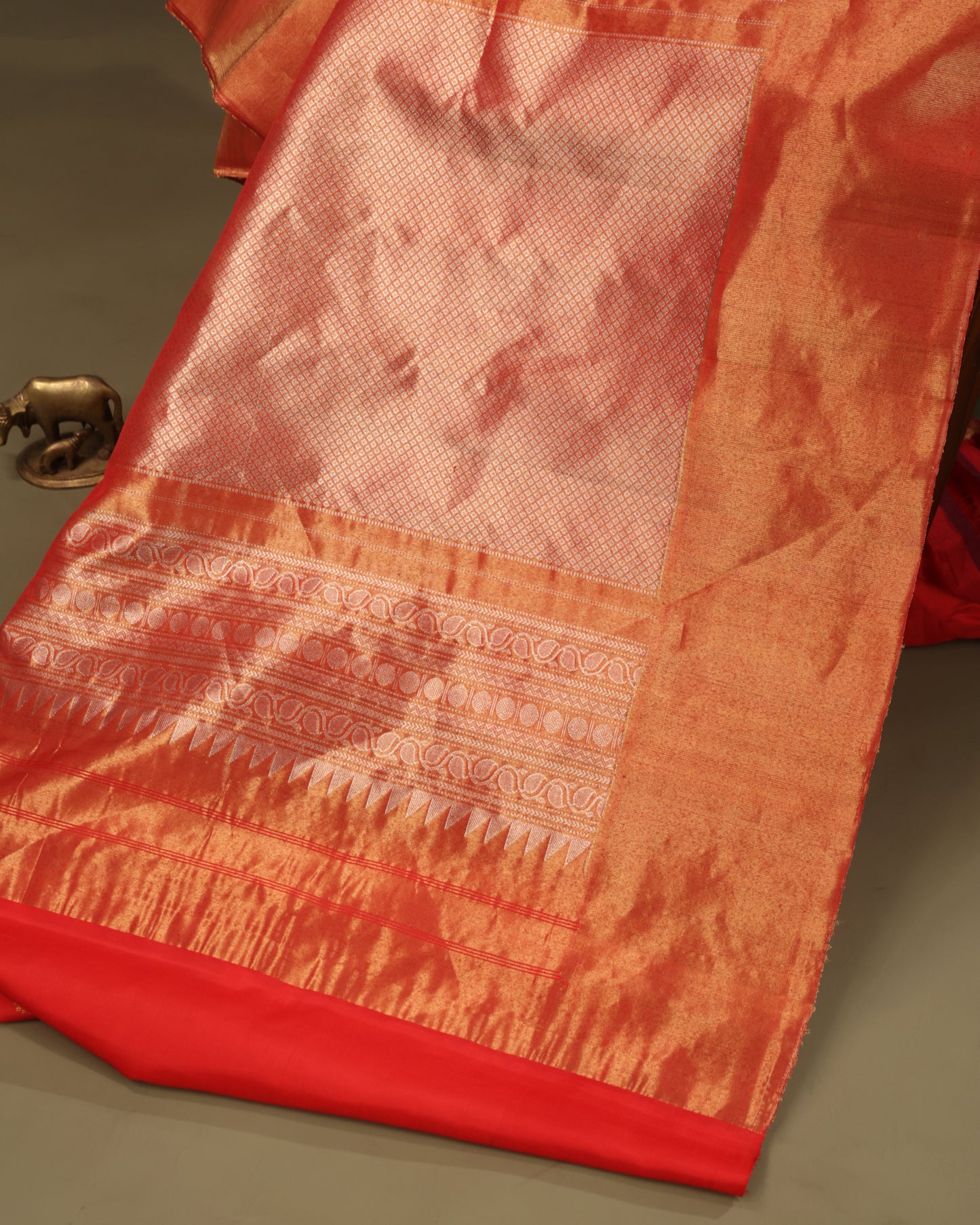 Traditional Gadwal silk saree with pink body and tissue border