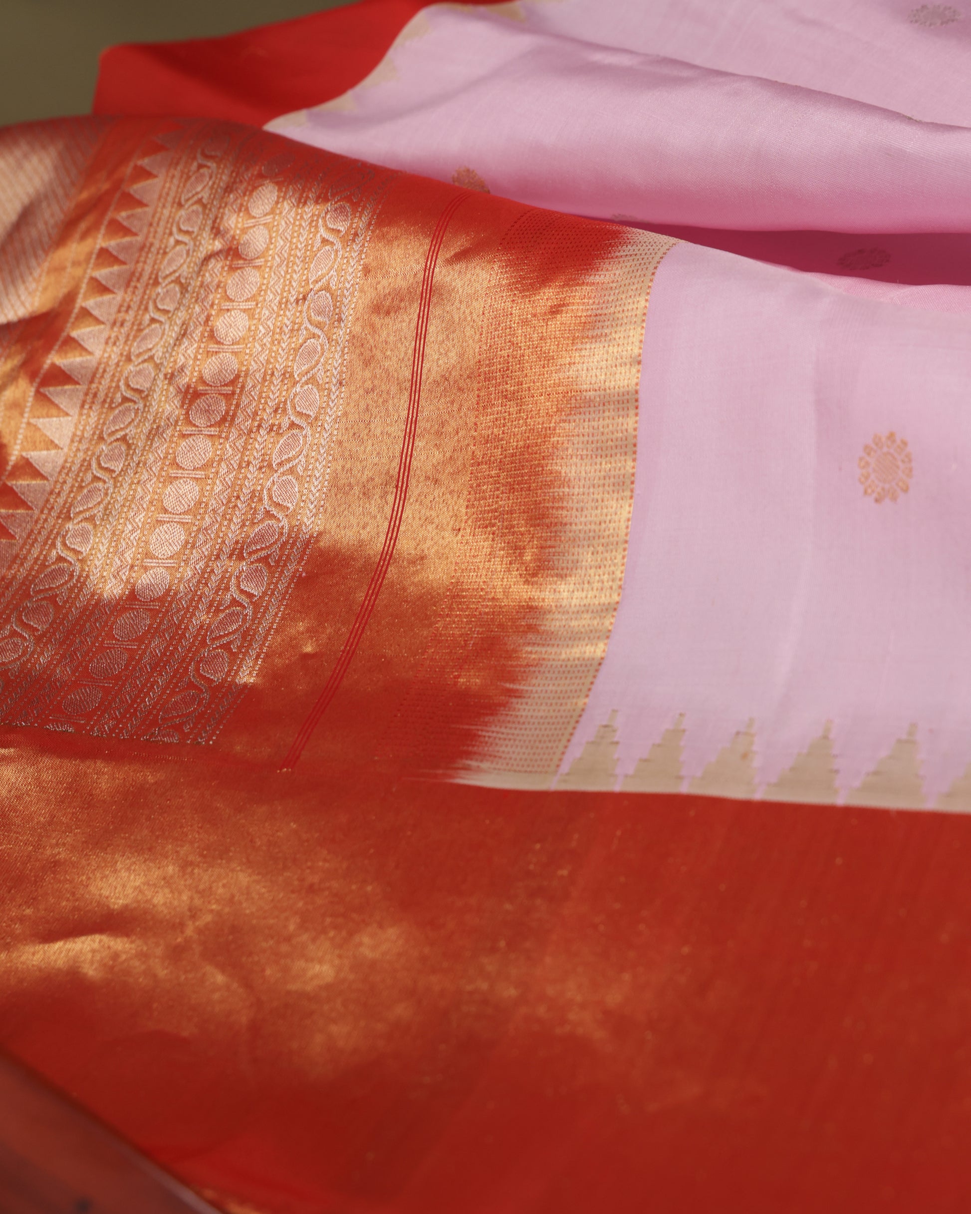Wedding wear pink Gadwal saree with contrast orange tissue border