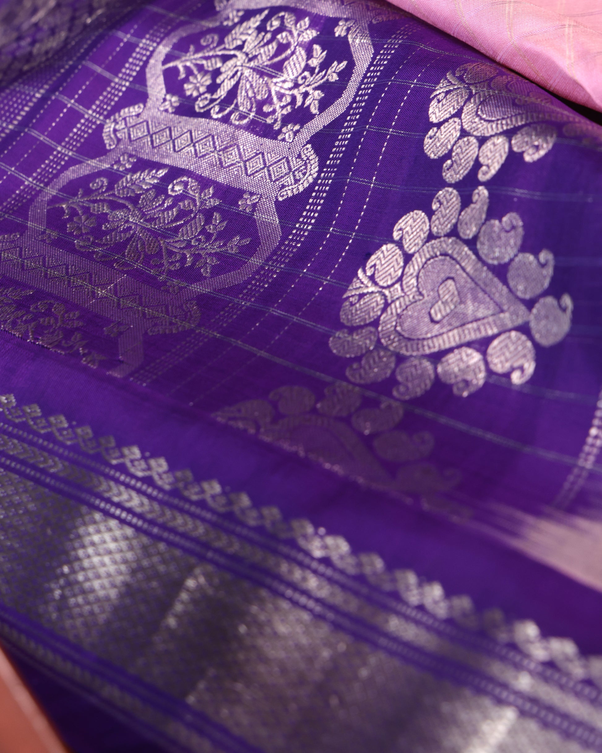 Unstitched purple blouse with silver zari border, included with Gadwal silk saree