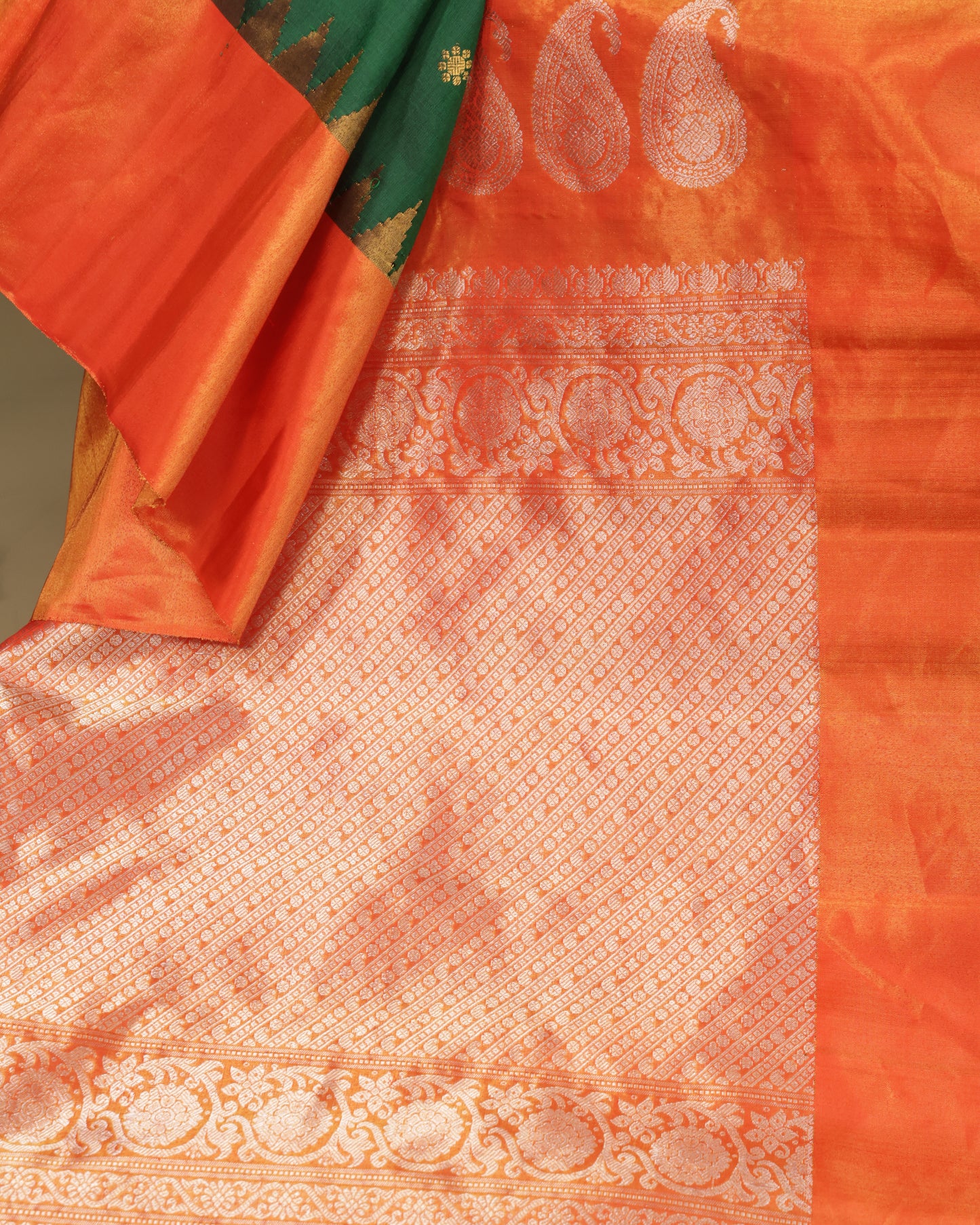 Elegant green Gadwal saree with festive orange contrast border