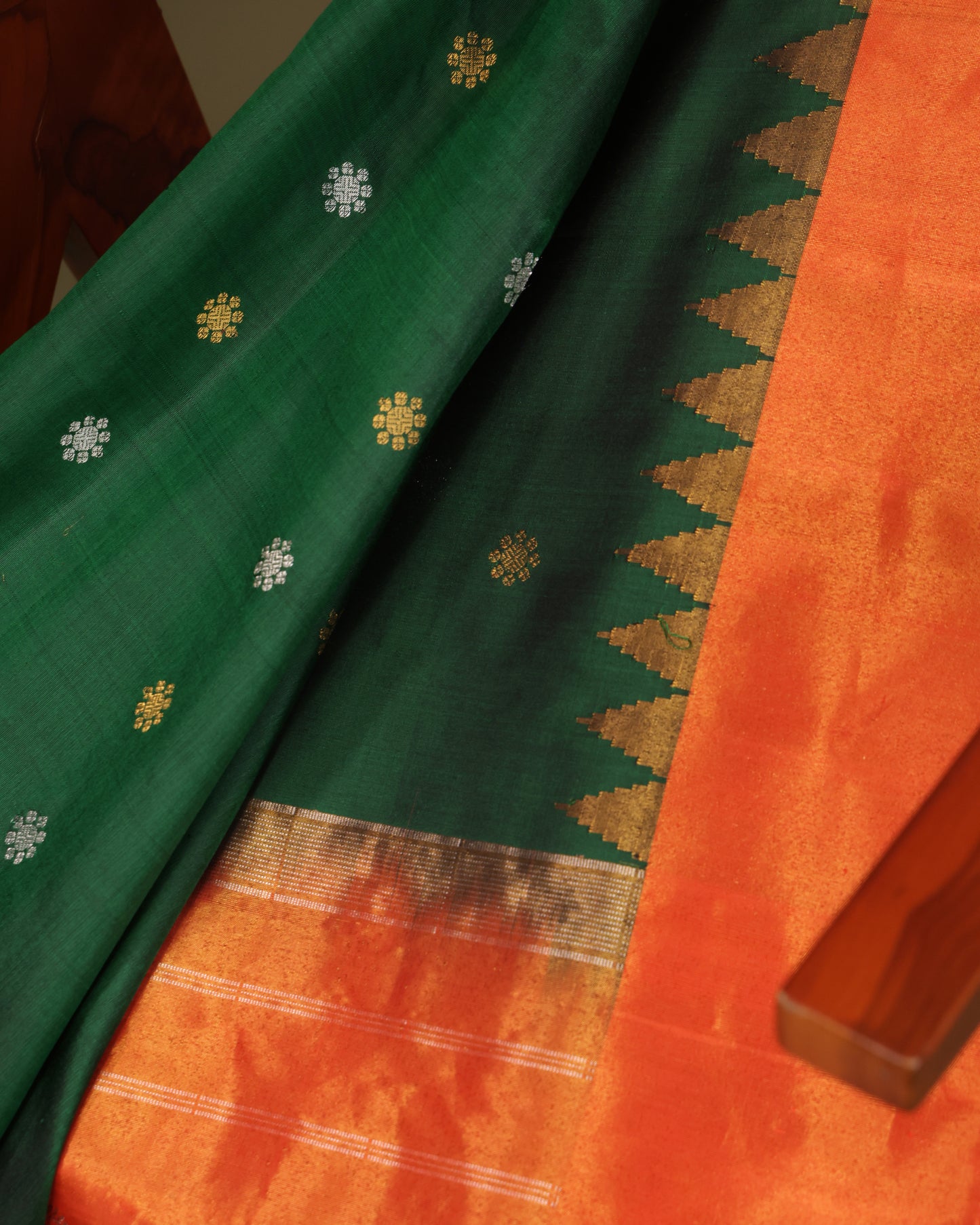Unstitched contrast orange blouse with zari buttas and tissue border, included with Gadwal silk saree