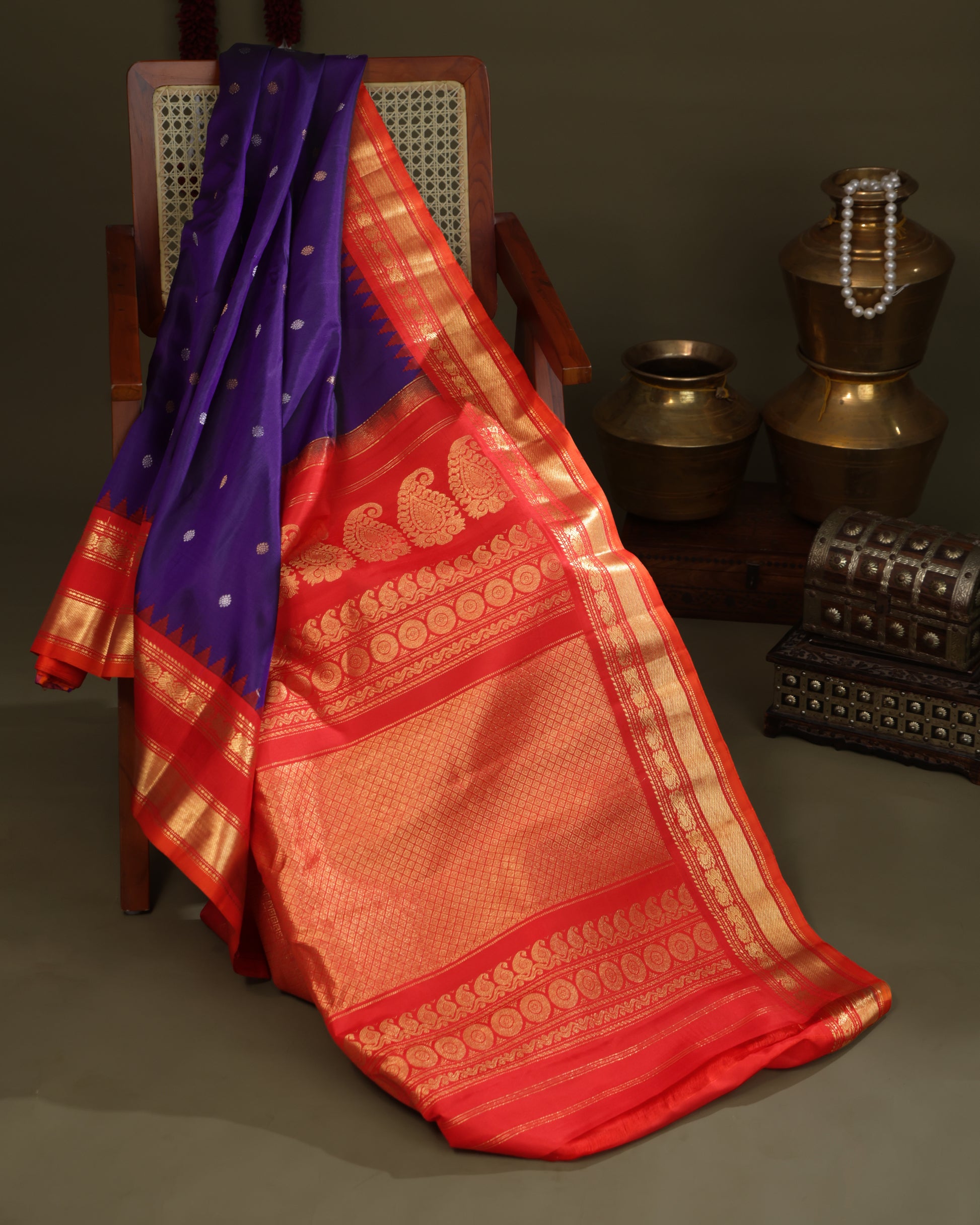 Traditional purple Gadwal saree with gold zari temple design