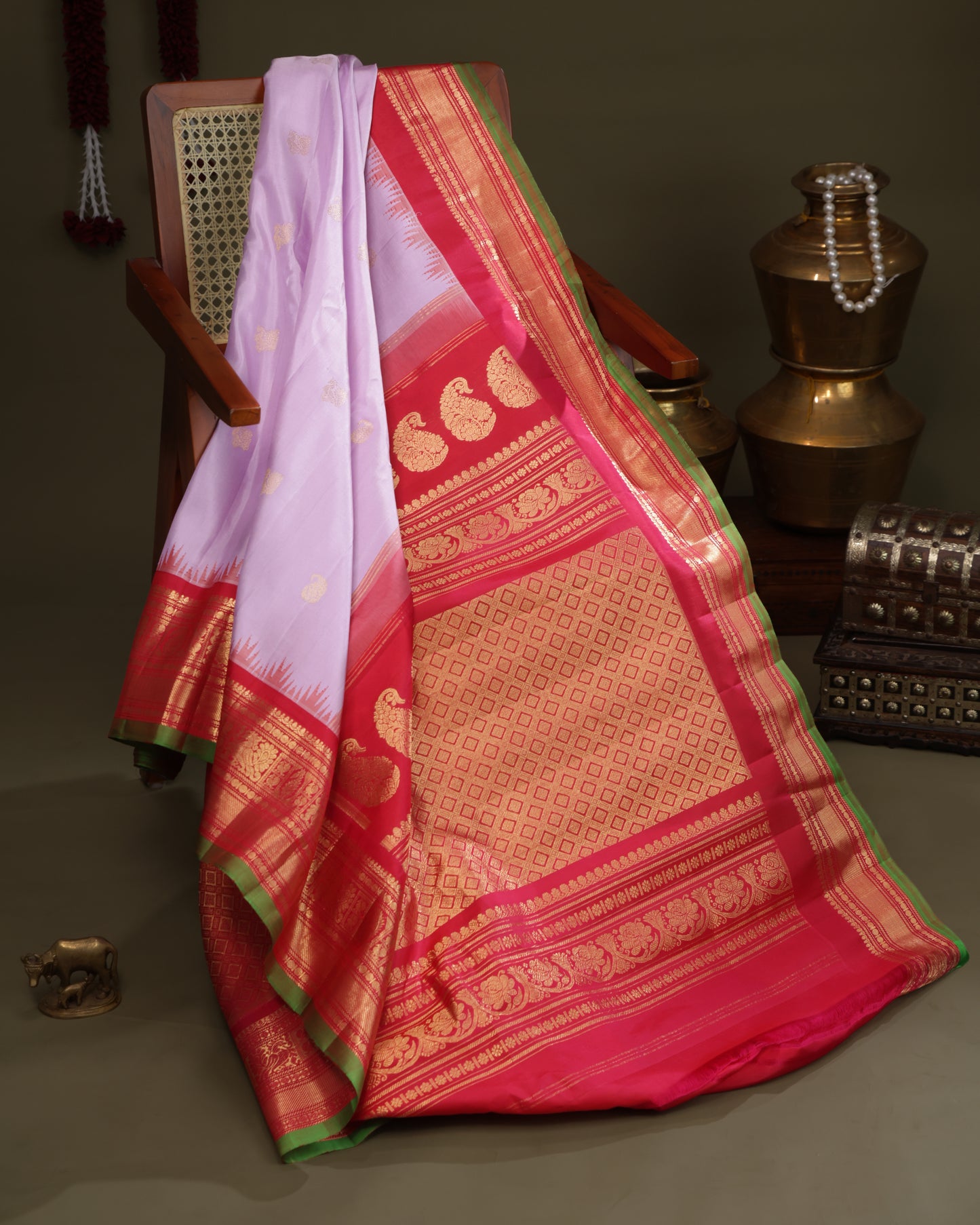 Zari buta motifs on lavender Gadwal silk saree