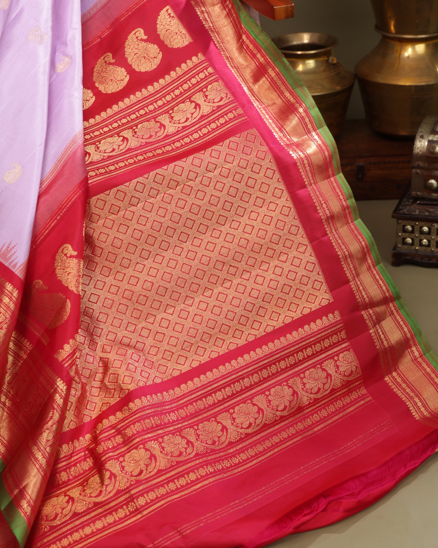 Red zari border with green selvedge on Gadwal silk saree