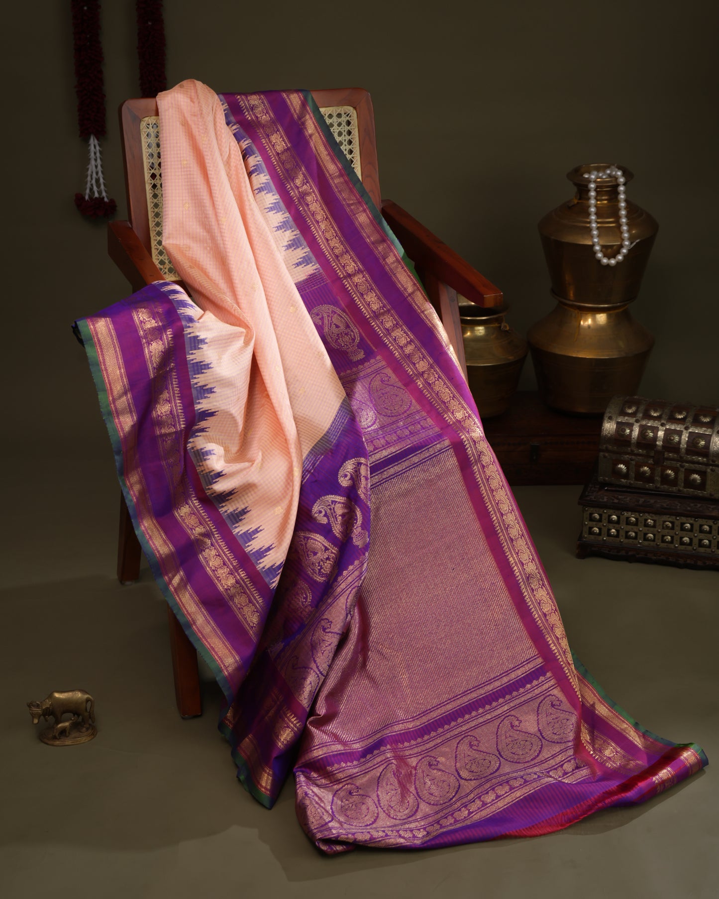 Paisley motifs on purple Gadwal silk saree pallu