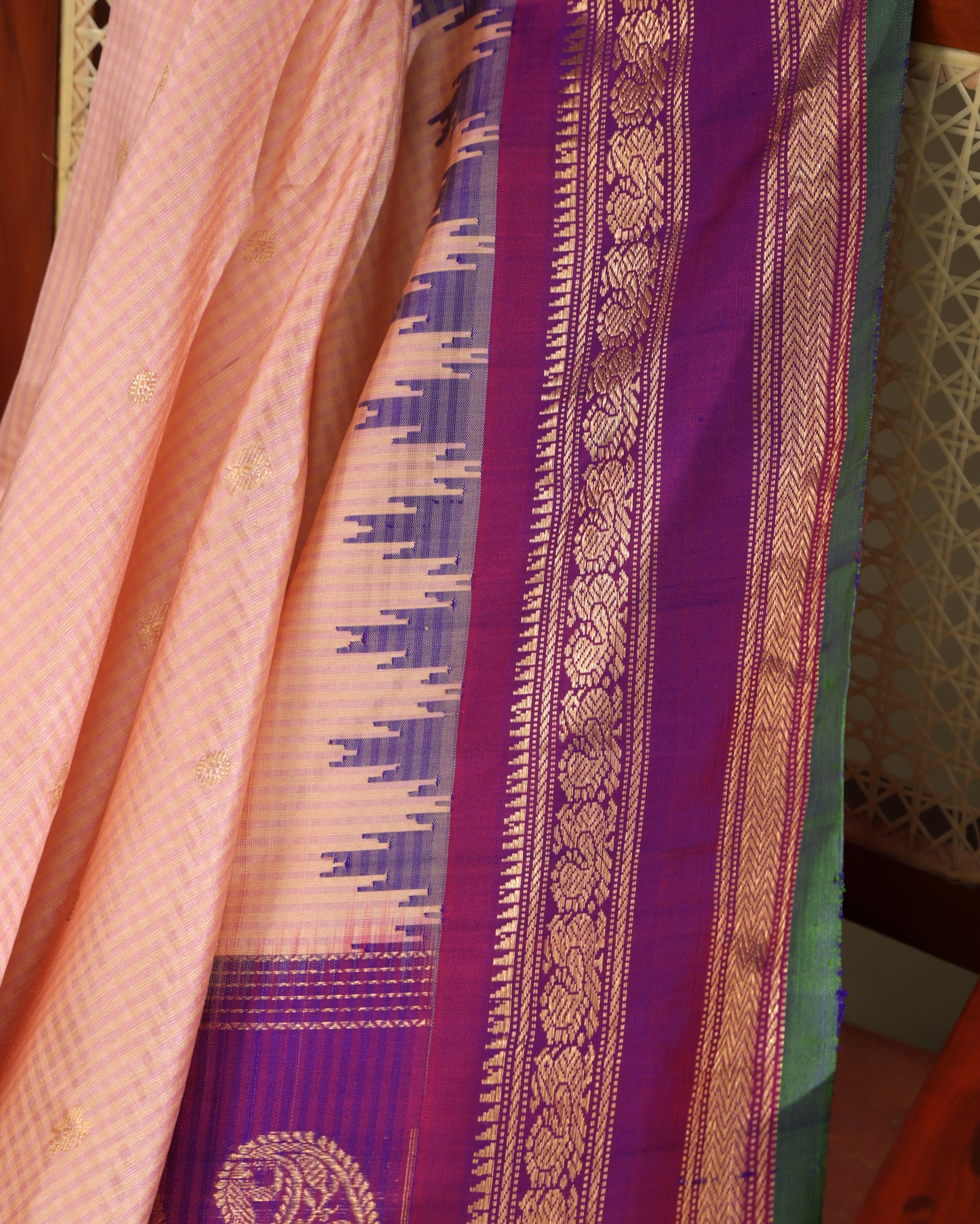 Peach Gadwal silk saree with purple blouse