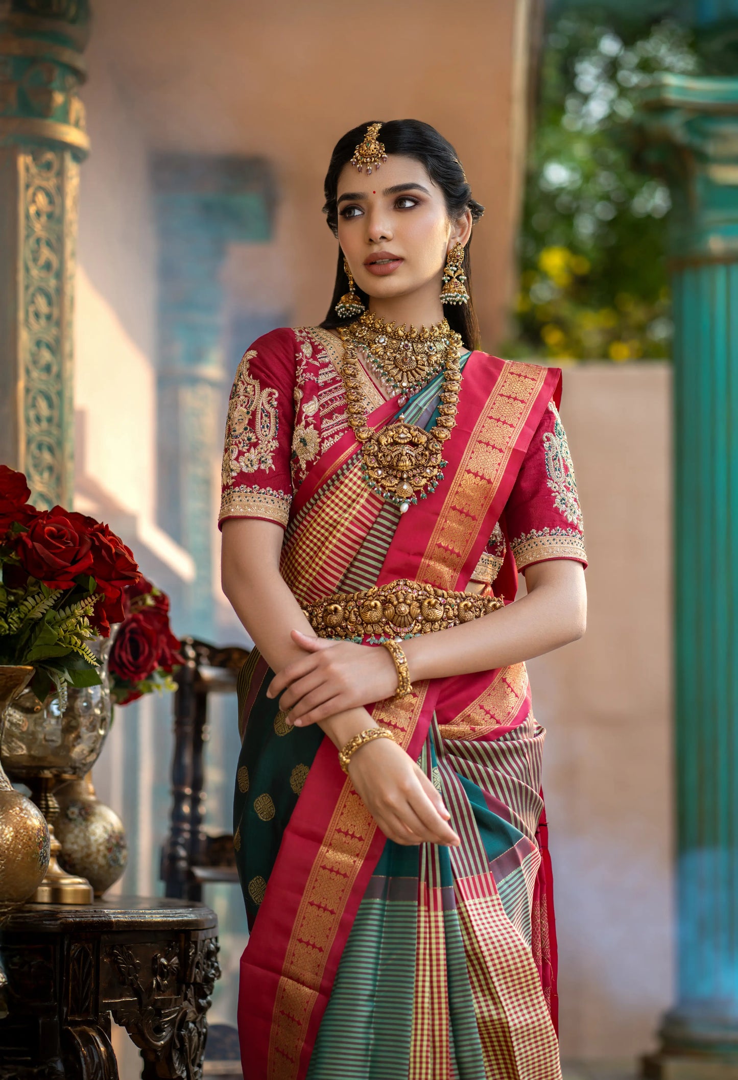 Teal green silk saree with red pallu – perfect for muhurtham and traditional ceremonies