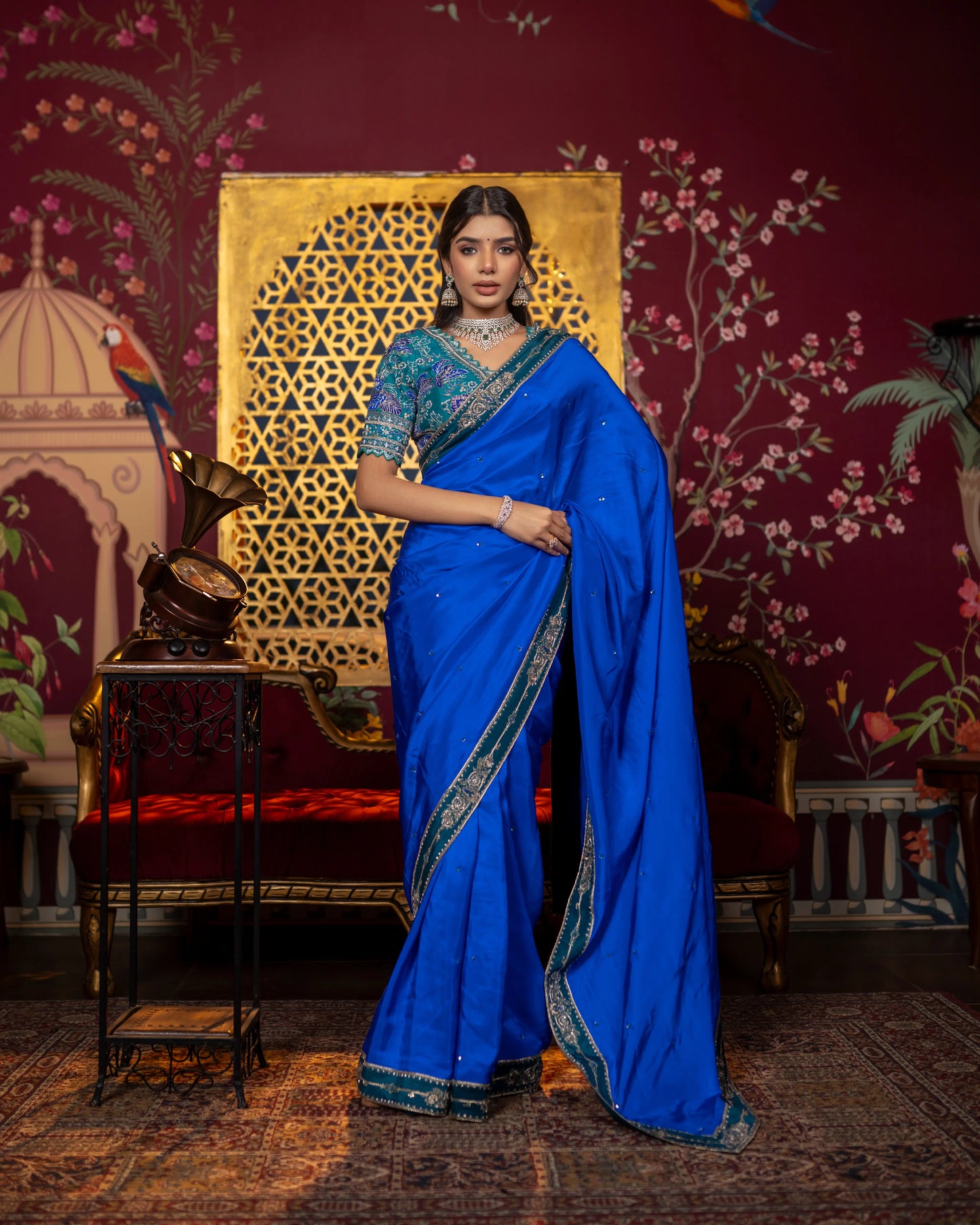 Elegant soft silk saree in blue with zari and sequin detailing on the border