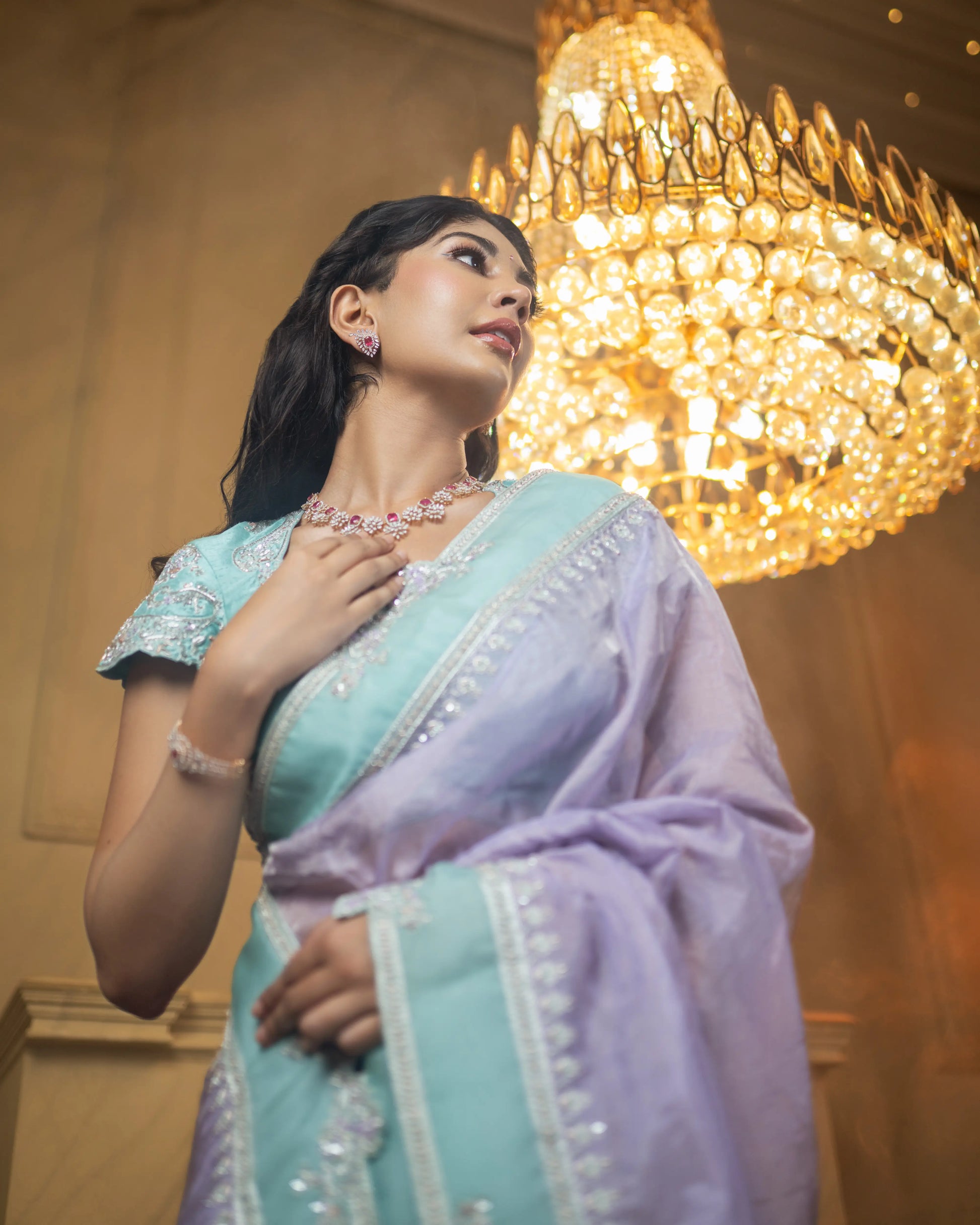 Designer lavender saree with stitched blouse and elegant aqua accents