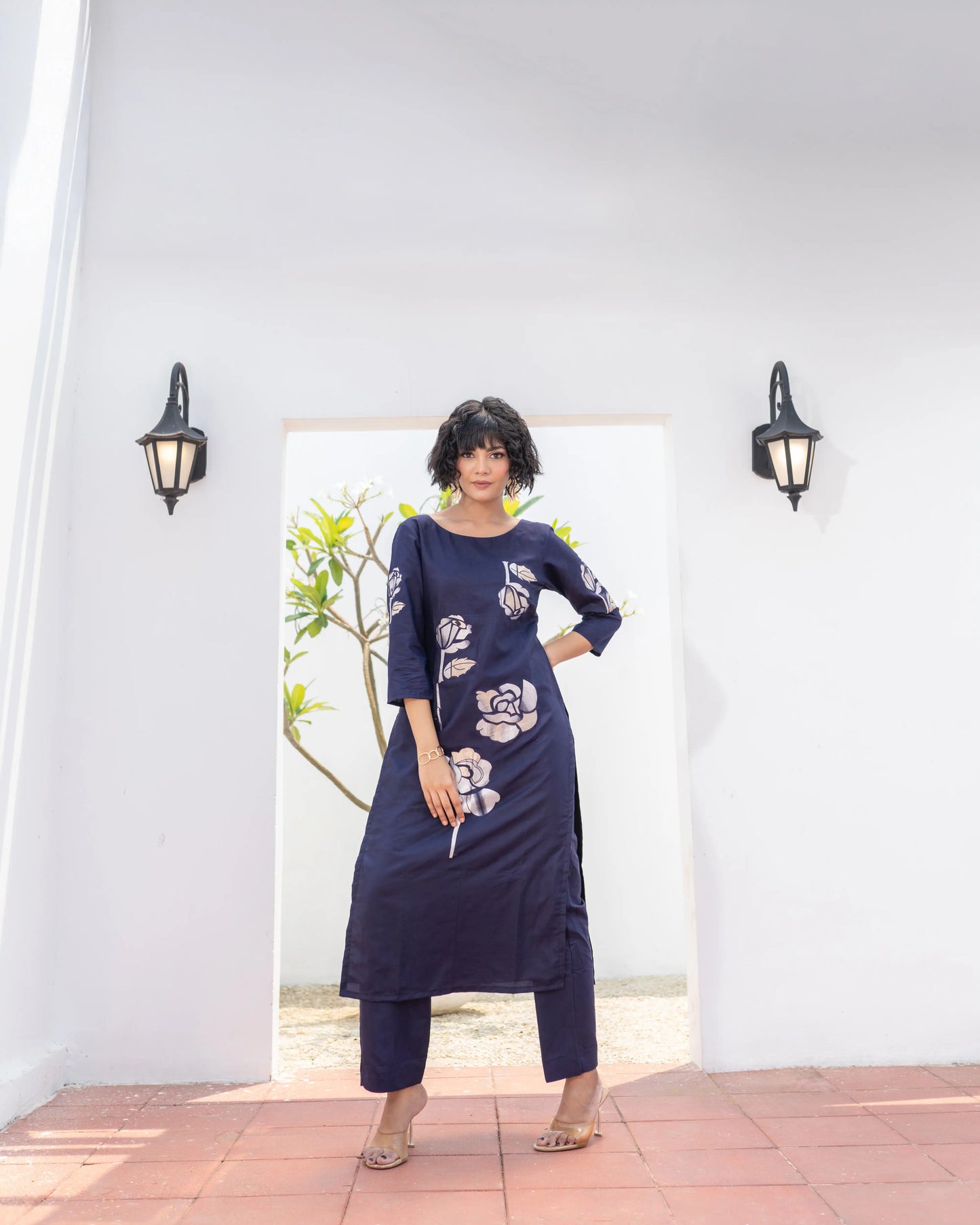 Subtle Banarasi floral work on navy blue cotton kurta – paired with minimalist straight pants