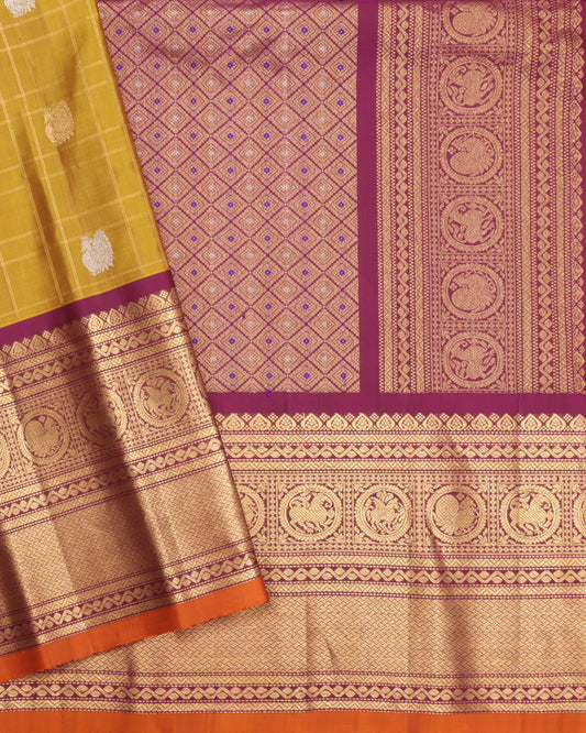 Mustard Yellow Gadwal Silk Saree with Purple Kanchi Border and Traditional Motifs