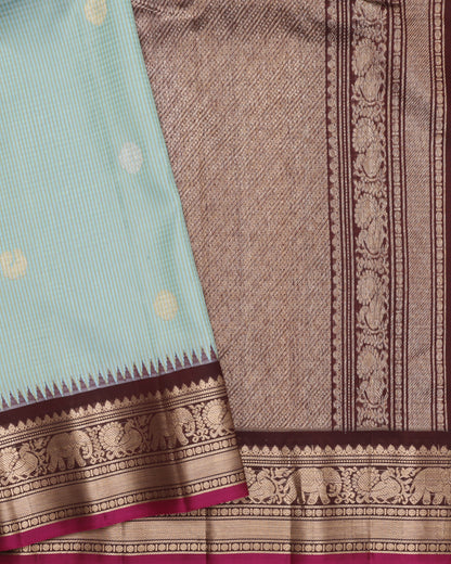 Sea green Gadwal silk saree with coffee brown zari border