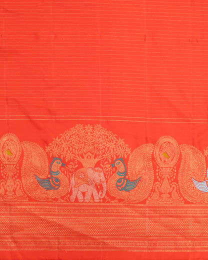 Orange blouse with zari border, included with red Gadwal silk saree