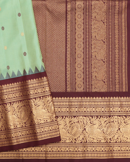 Aqua green Gadwal silk saree with coffee brown border