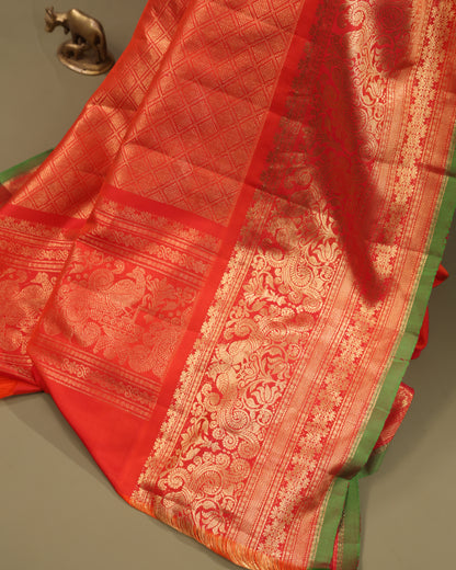 Traditional Gadwal saree in brown with rich orange border and zari pallu