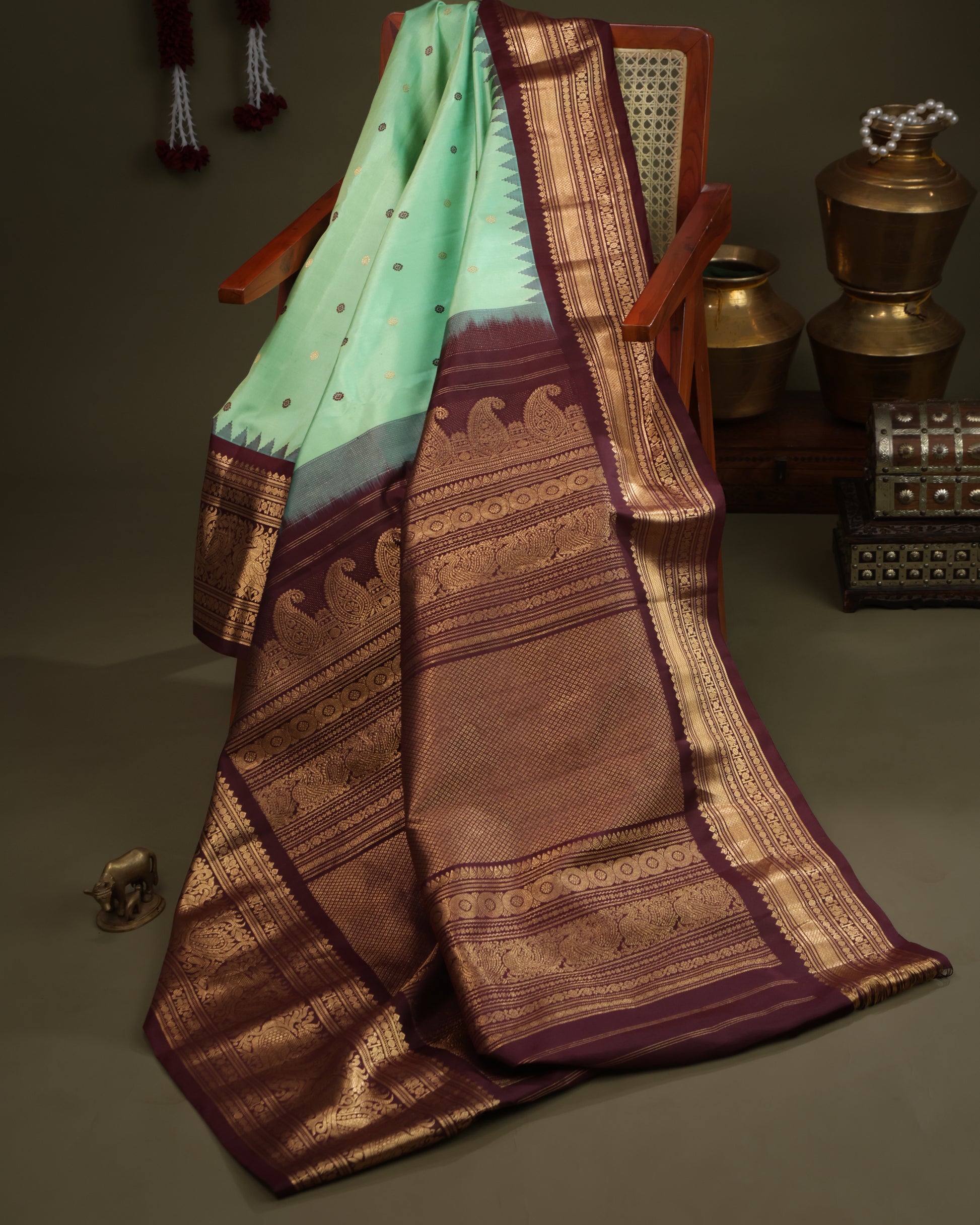 Gadwal silk saree with aqua green body and zari buttas