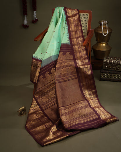 Aqua green saree with zari pallu and peacock motifs