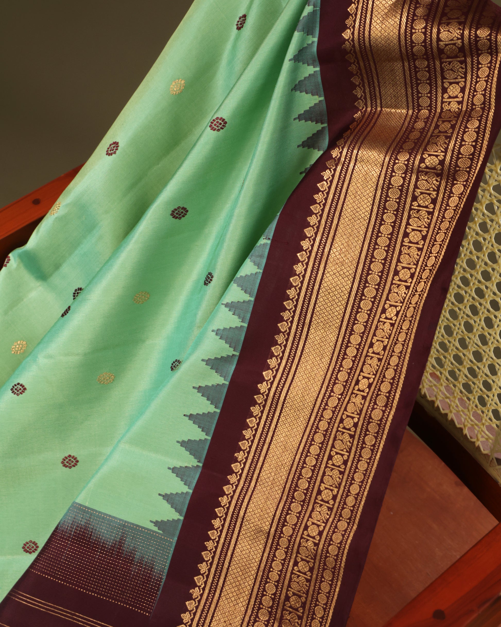 Festive aqua green Gadwal silk saree with coffee brown border