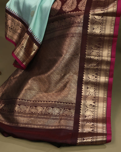 Sea green Gadwal silk saree with zari buta detailing