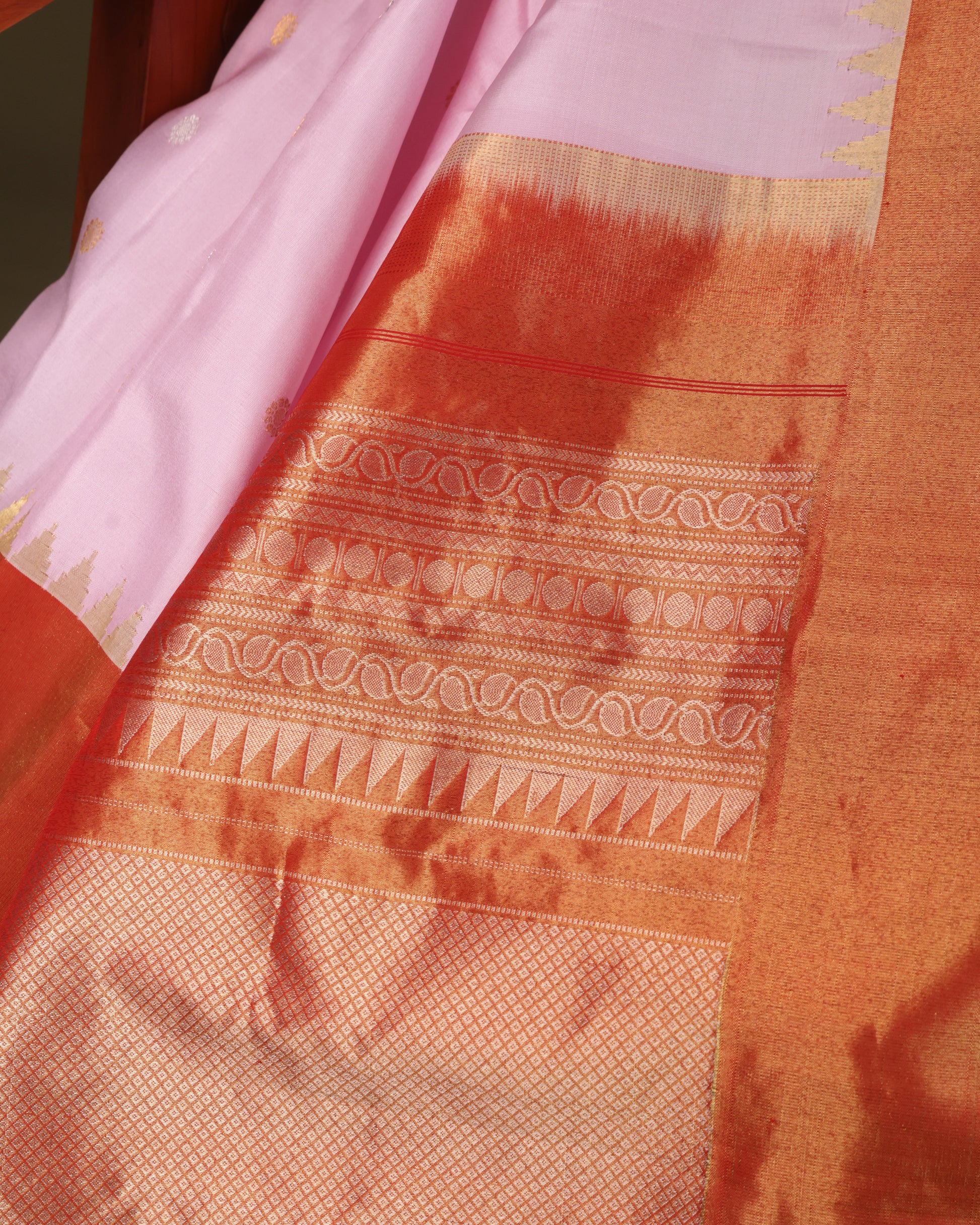 Soft pink and orange Gadwal saree with Kanchi tissue pallu