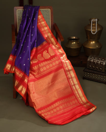 Traditional purple Gadwal saree with gold zari temple design