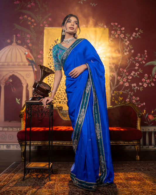 Royal blue soft silk saree with embellished green embroidered border – House of Ishwari